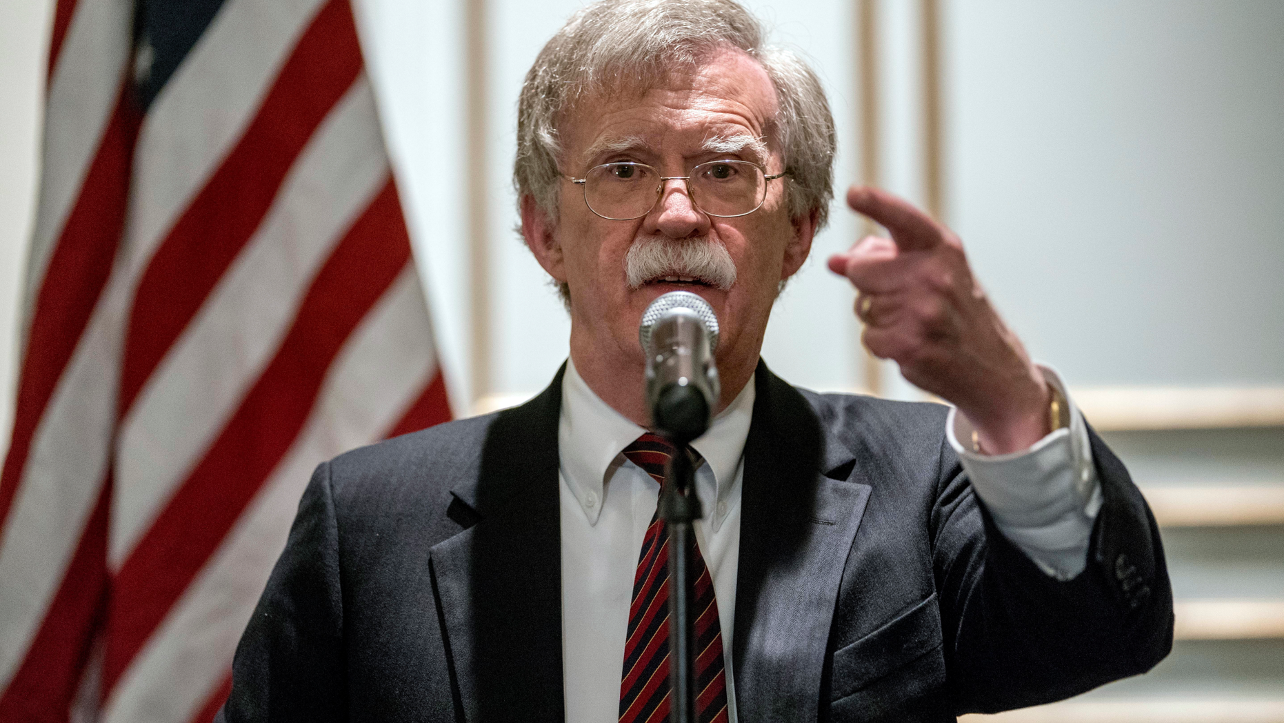 National security adviser John Bolton calls on a reporter during a news conference after speaking at a Federalist Society luncheon at the Mayflower Hotel, Monday, Sept. 10, 2018, in Washington. (AP Photo/Andrew Harnik)