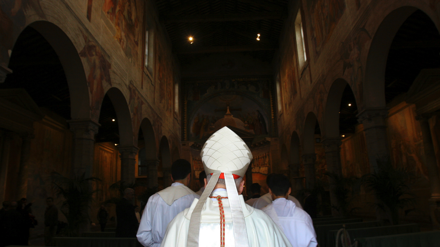FILE - In this April 14, 2005 file photo, Washington Cardinal Theodore McCarrick enters the St. Nereus and Achilleus Church in Rome. In July 2018, Pope Francis removed the U.S. church leader as a cardinal after church investigators said an allegation that he groped a teenage altar boy in the 1970s was credible. Subsequently, several former seminarians and priests reported that they too had been abused or harassed by McCarrick as adults. (AP Photo/ Alessandra Tarantino)