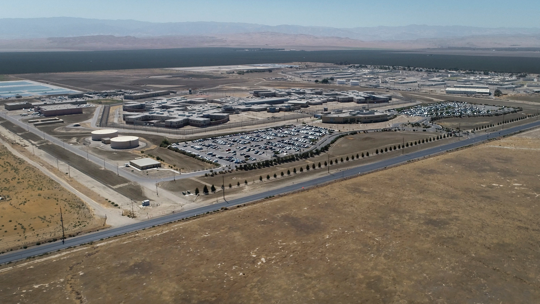 The Coalinga State Hospital, which houses sexually violent predators, is shown near Coalinga, Calif., Sept. 16, 2018. About 30 men in the country illegally and with sex crime records remain in custody despite having completed their sentences and wanting to be deported. (Craig Kohlruss/Fresno Bee via AP)