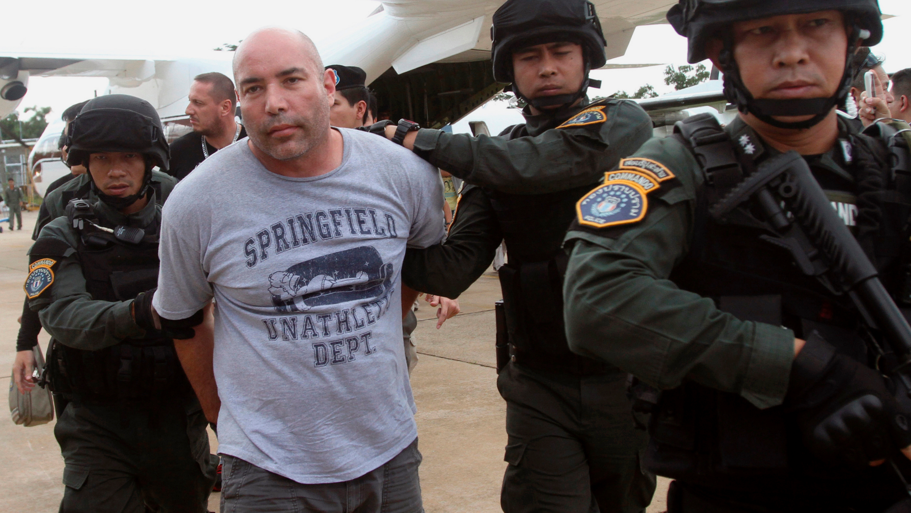 Joseph Hunter, second from left, a former U.S. Army sniper who became a private mercenary, and two other former U.S. Army solders were convicted for a contract killing order by an international crime boss.