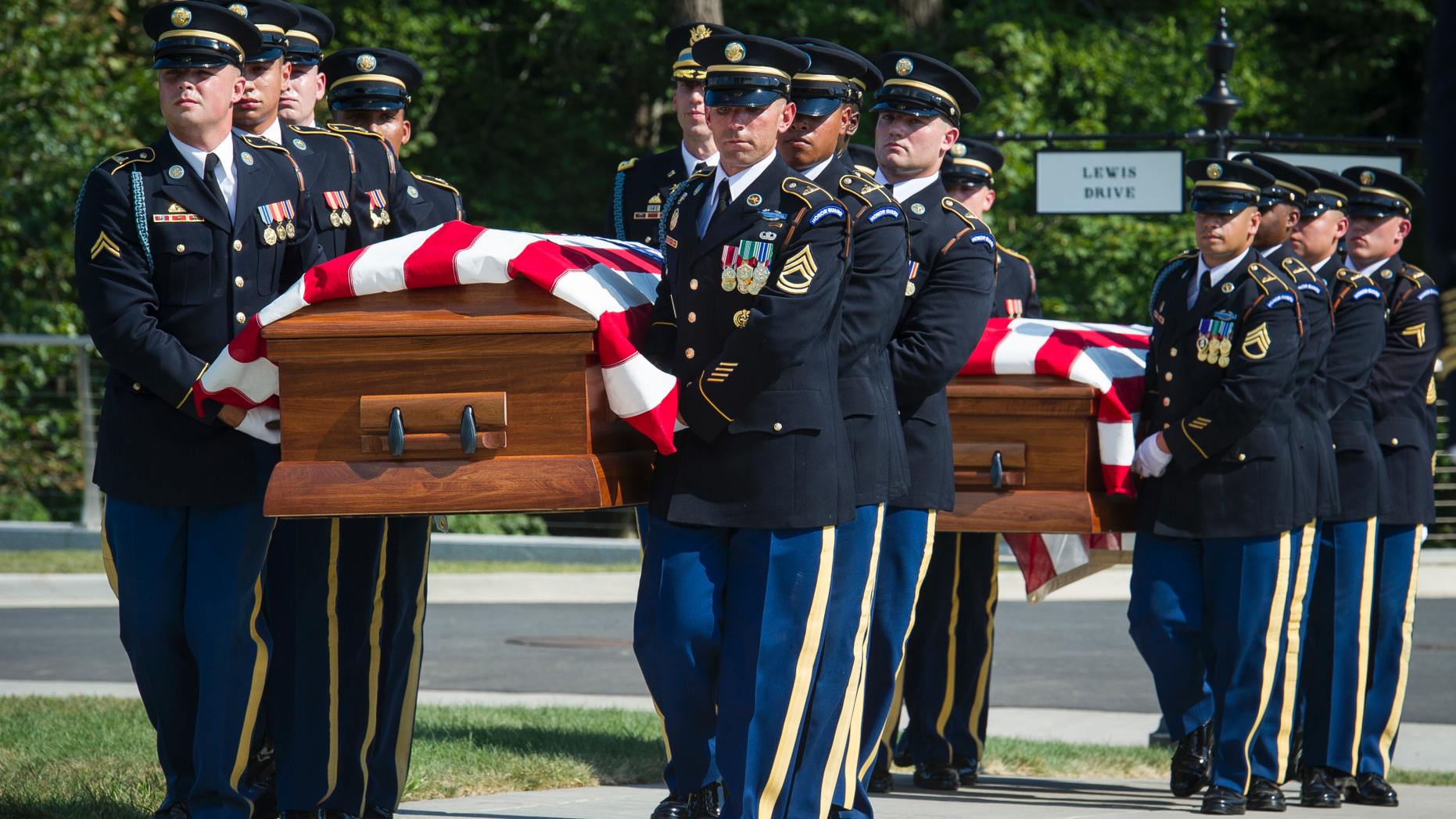 The 3rd Infantry Regiment, also known as the Old Guard, casket teams carry the remains of two unknown Civil War Union soldiers to their grave at Arlington National Cemetery in Arlington, Va., Thursday, Sept. 6, 2018. The soldiers were discovered at Manassas National Battlefield and will be buried in Section 81. Arlington National Cemetery opened the new section of gravesites with the burial. (AP Photo/Cliff Owen)