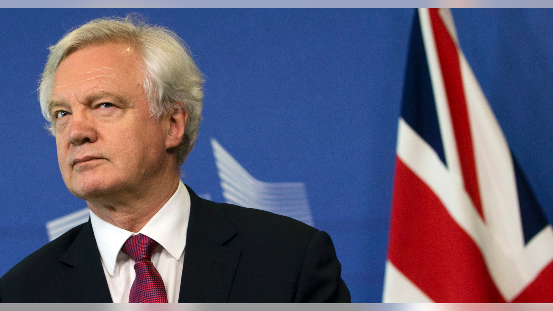 In this Monday June 19, 2017 file photo, British Secretary of State for Exiting the EU David Davis listens to opening remarks during his arrival at EU headquarters in Brussels. U.K. and European Union negotiators should be able to move from talks about Britain’s divorce terms to negotiating future relations before the end of the year, the top U.K. Brexit official said Tuesday, July 11, 2017.