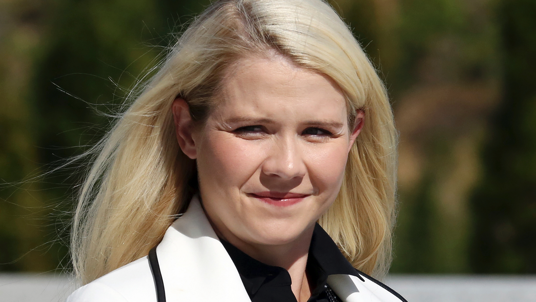 Elizabeth Smart arrives for a news conference Thursday, Sept. 13, 2018, in Salt Lake City. Smart says it appears there is no viable, legal recourse she can take to stop the release of one of her kidnappers. Smart said at a news conference Thursday in Salt Lake City that she only found out about 72-year-old Wanda Barzee's release shortly before the public did. (AP Photo/Rick Bowmer)