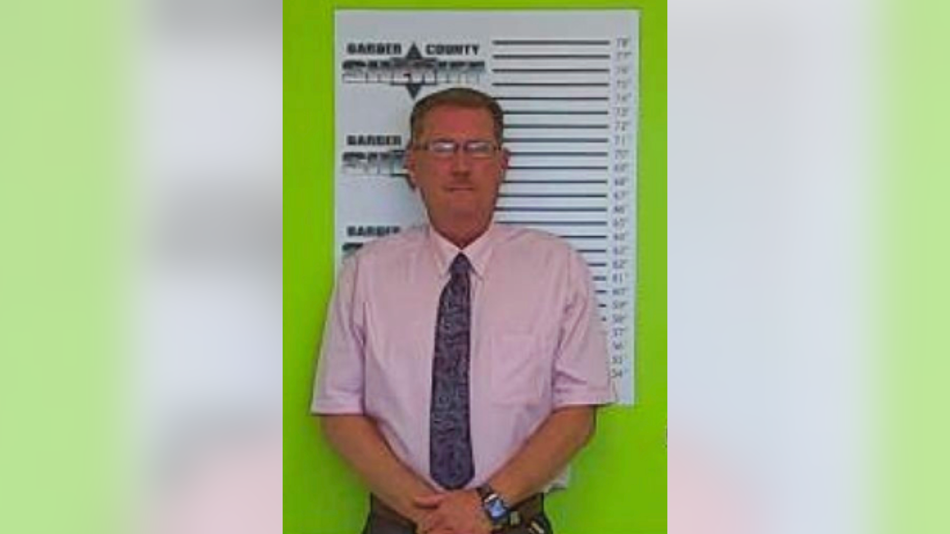 This Wednesday, Sept. 5, 2018 booking photo released by the Kansas Bureau of Investigation shows Virgil "Dusty" Brewer. The Kansas undersheriff who fatally shot a man at close range with a beanbag has been charged with involuntary manslaughter. Kansas Bureau of Investigation agents arrested Brewer Wednesday at the Barber County Courthouse. (Kansas Bureau of Investigation via AP)
