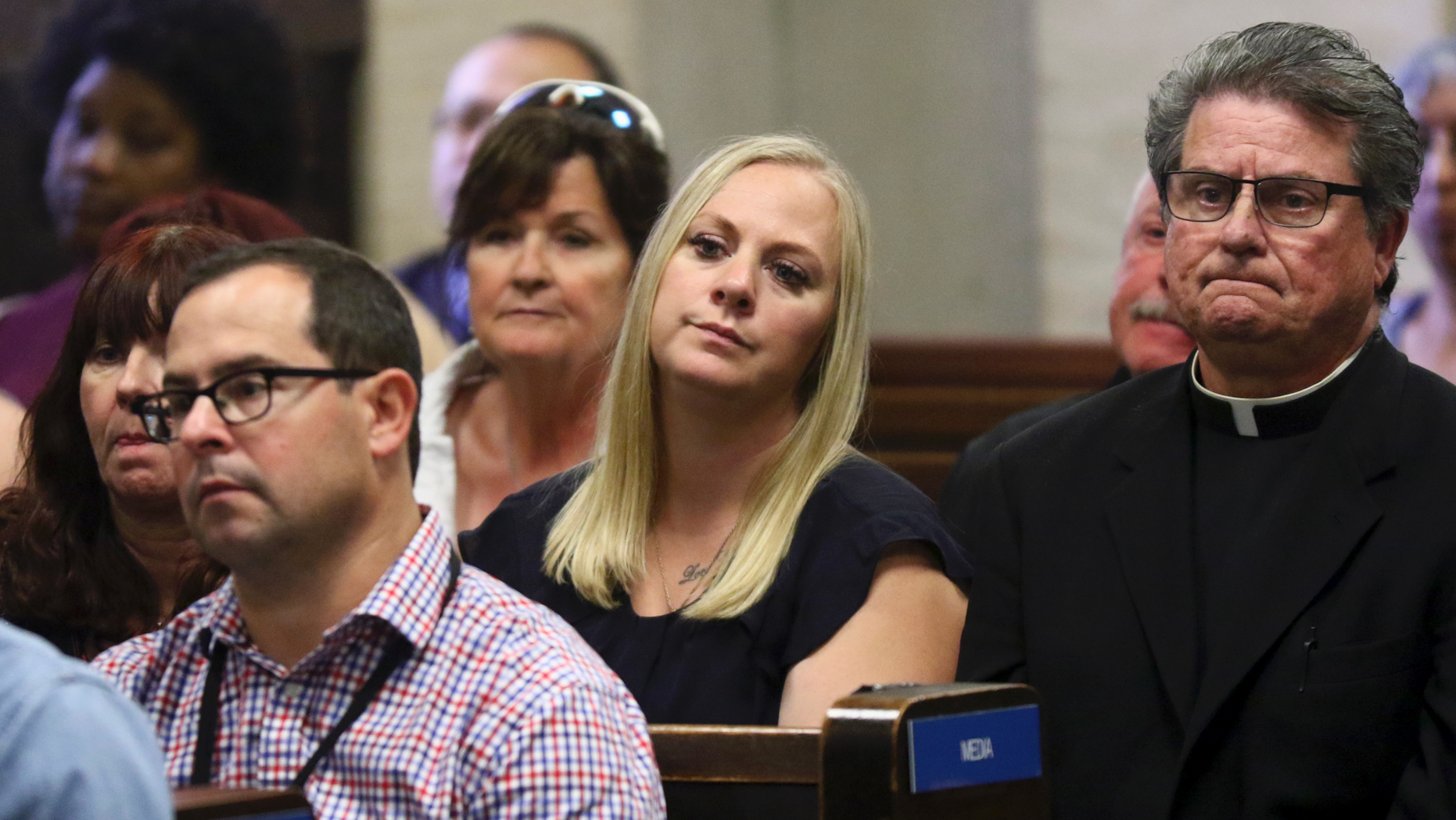 Tiffany Van Dyke, the wife of Chicago police Officer Jason Van Dyke, listens during her husband's murder trial for the 2014 shooting death of Laquan McDonald at the Leighton Criminal Court Building on Wednesday, Sept. 26, 2018, in Chicago. (John J. Kim/Chicago Tribune via AP, Pool)