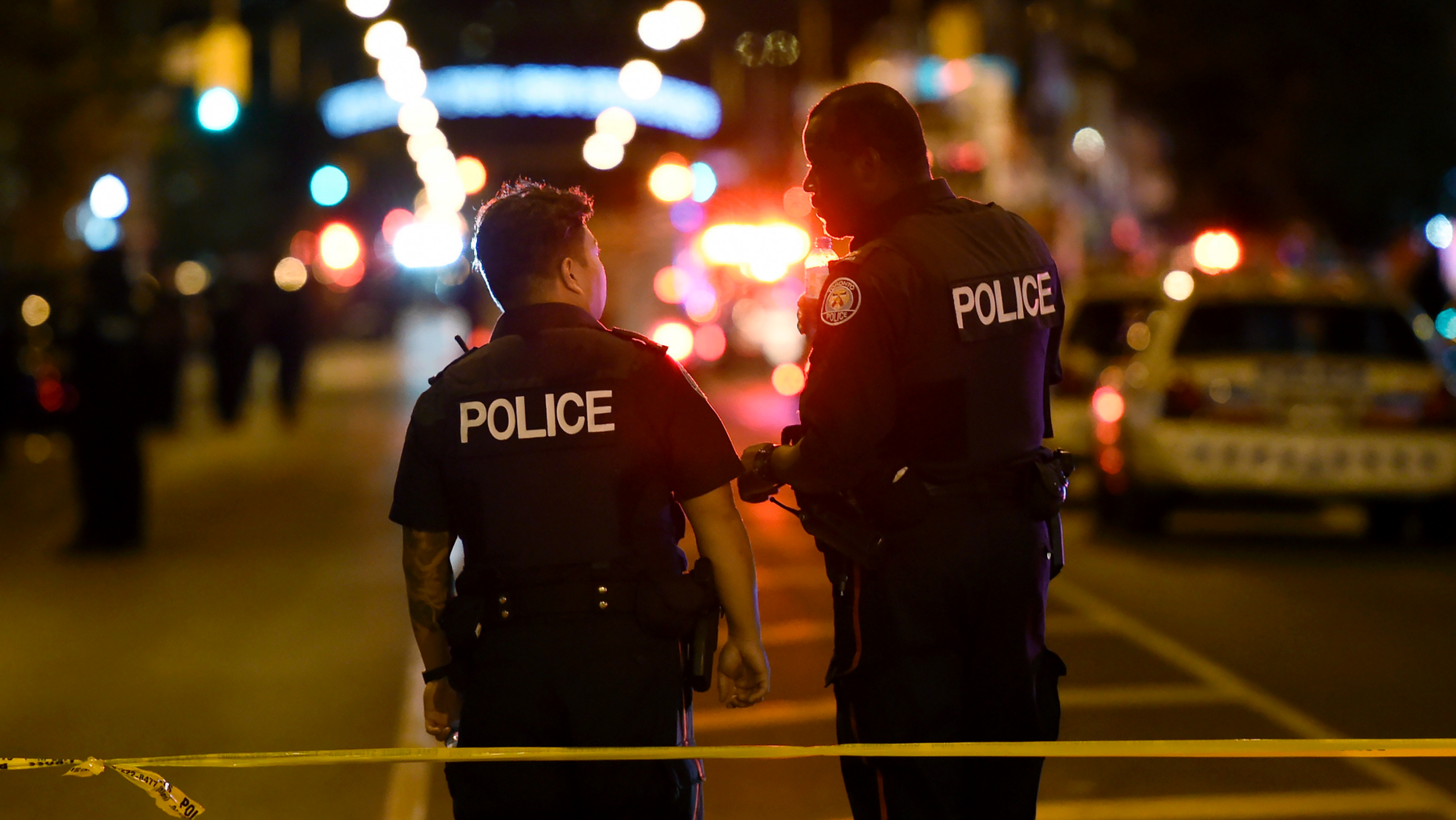 FILE - In this July 22, 2018 file photo, police work the scene of a shooting in Toronto, Canada. The man who went on a shooting rampage that killed two people and wounded 13 in Toronto was an emotionally disturbed loner and did not appear to act out of any particular ideological motivation, according to police documents released on Thursday, Sept 20. (Nathan Denette/The Canadian Press via AP, File)