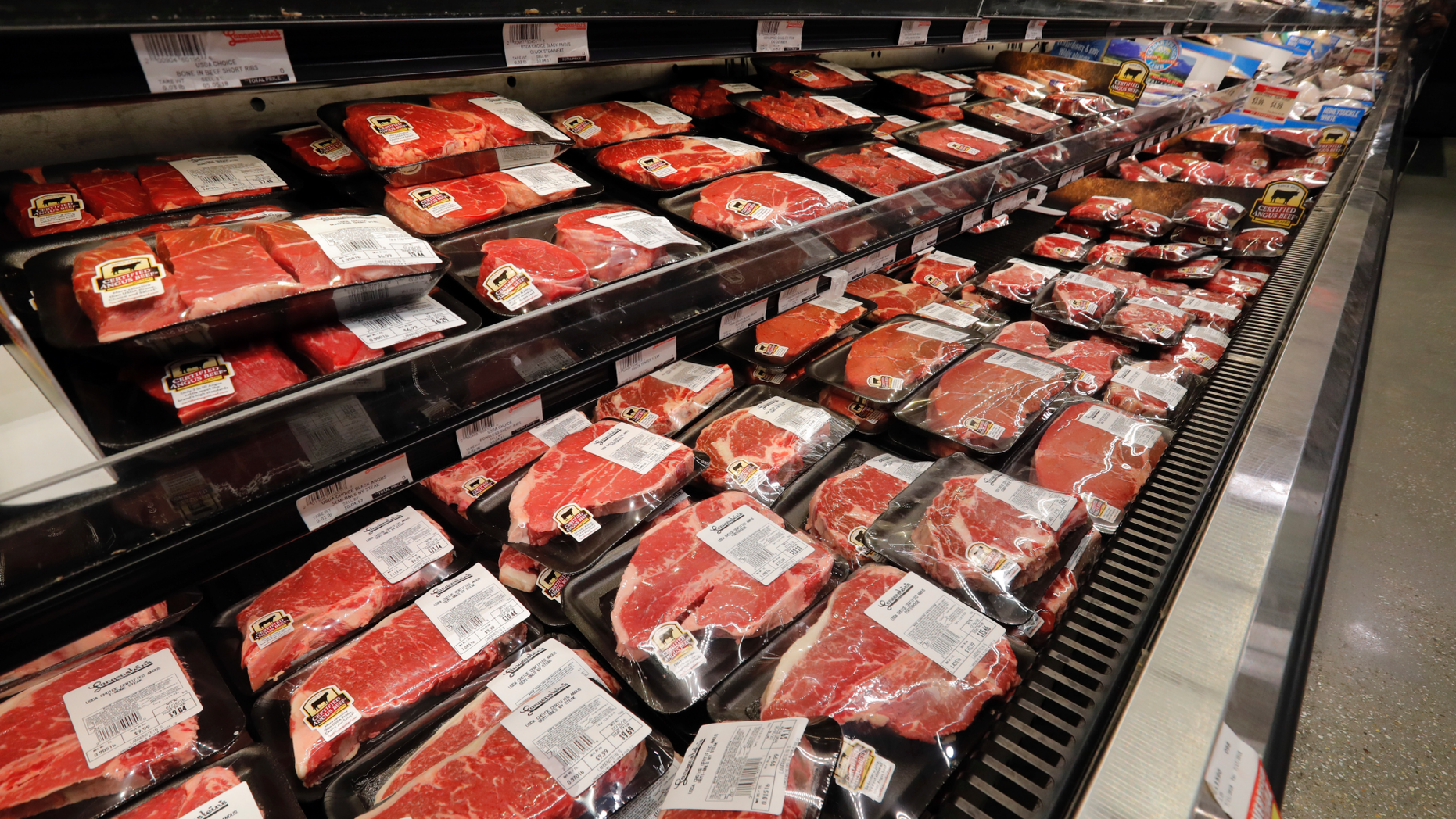 FILE- In this July 11, 2018, file photo meat is displayed at a grocery store in River Ridge, La. On Thursday, Sept. 13, the Labor Department reports on U.S. consumer prices for August. (AP Photo/Gerald Herbert, File)