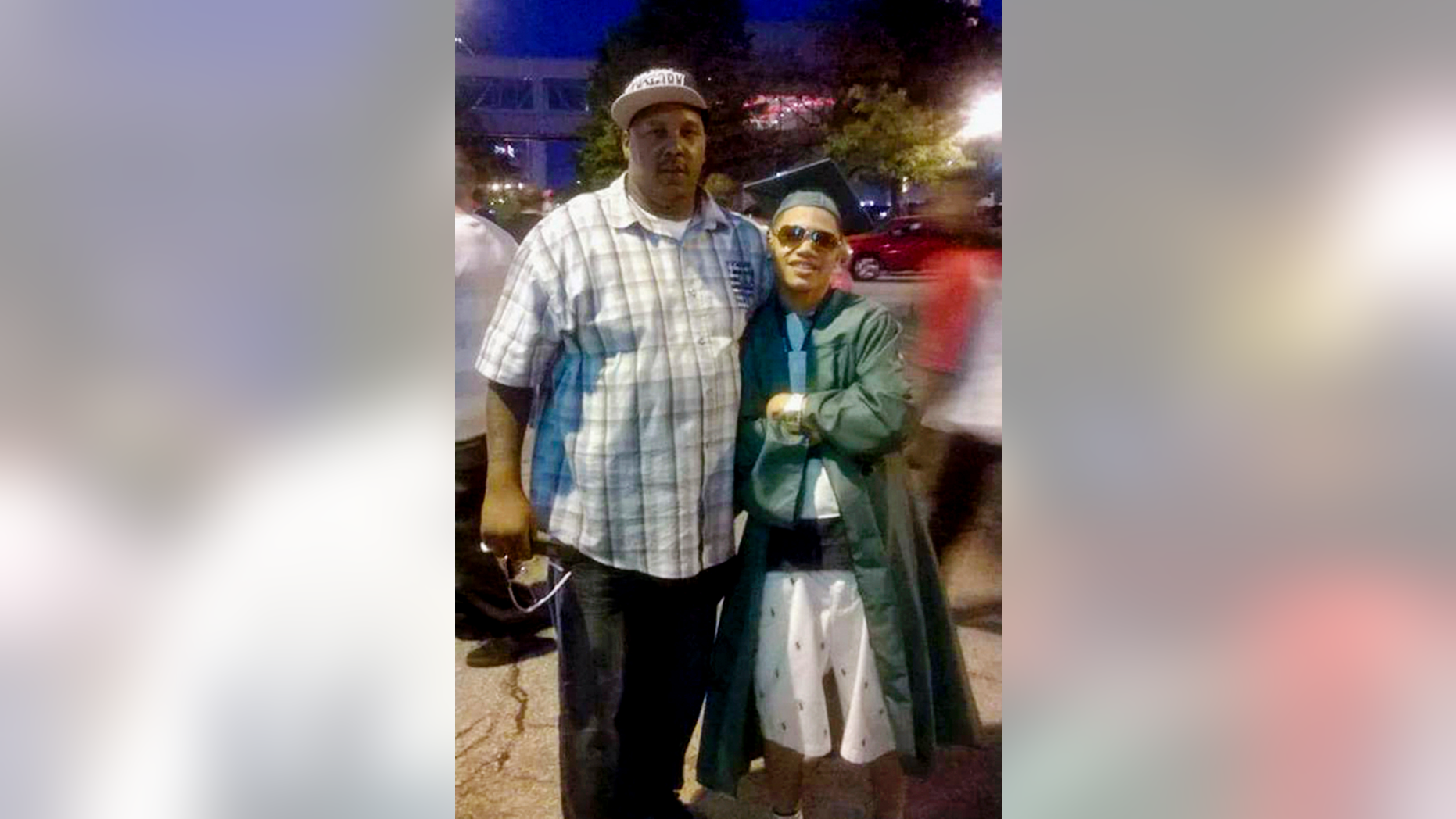 Terrill Thomas, seen at left with his son Terrill Barnes in this undated photo, died of dehydration in jail.