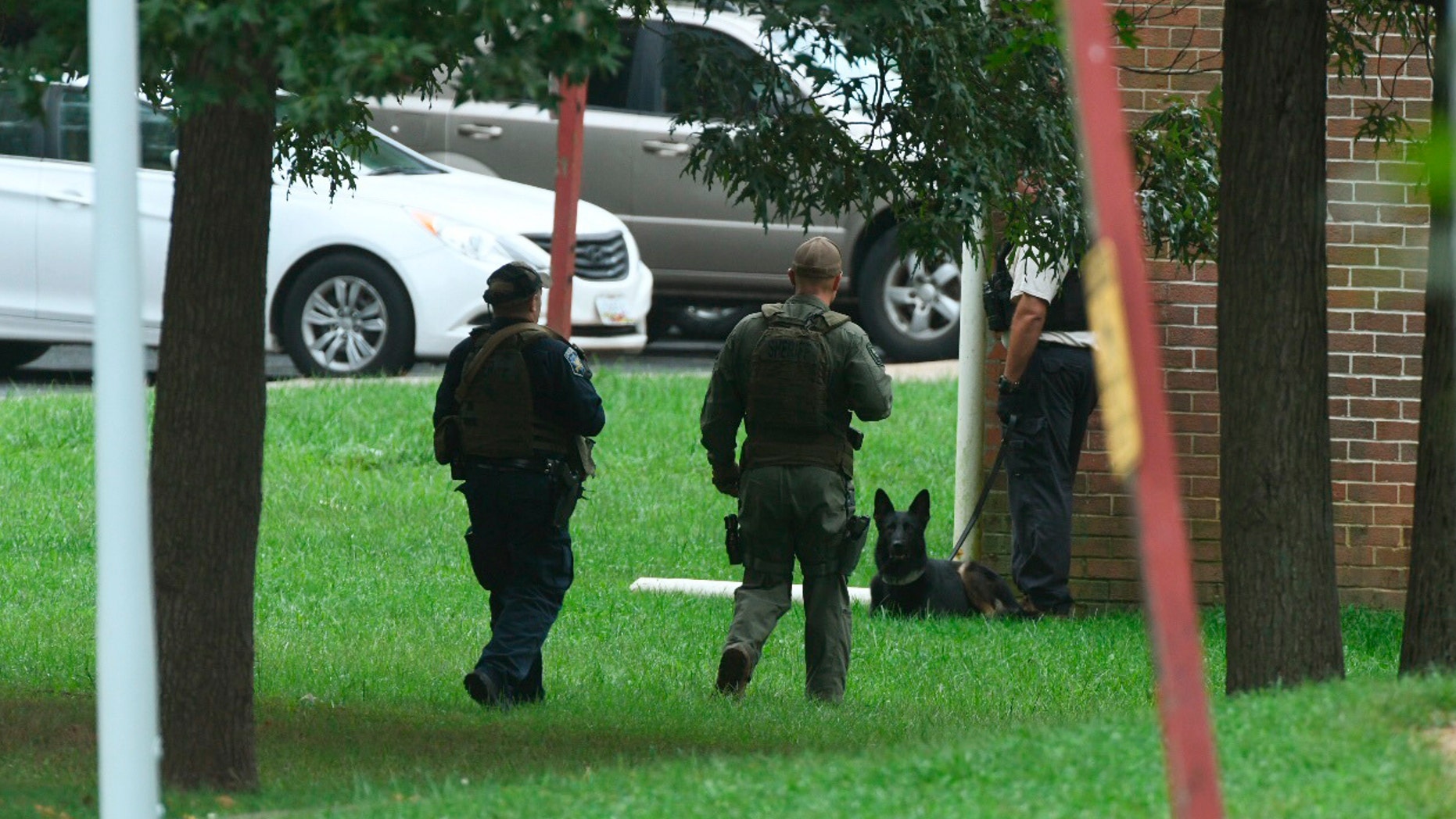 Authorities respond to a shooting in Harford County, Md., Thursday, Sept. 20, 2018. Authorities say multiple people have been shot in northeast Maryland in what the FBI is describing as an "active shooter situation." (Jerry Jackson /The Baltimore Sun via AP)
