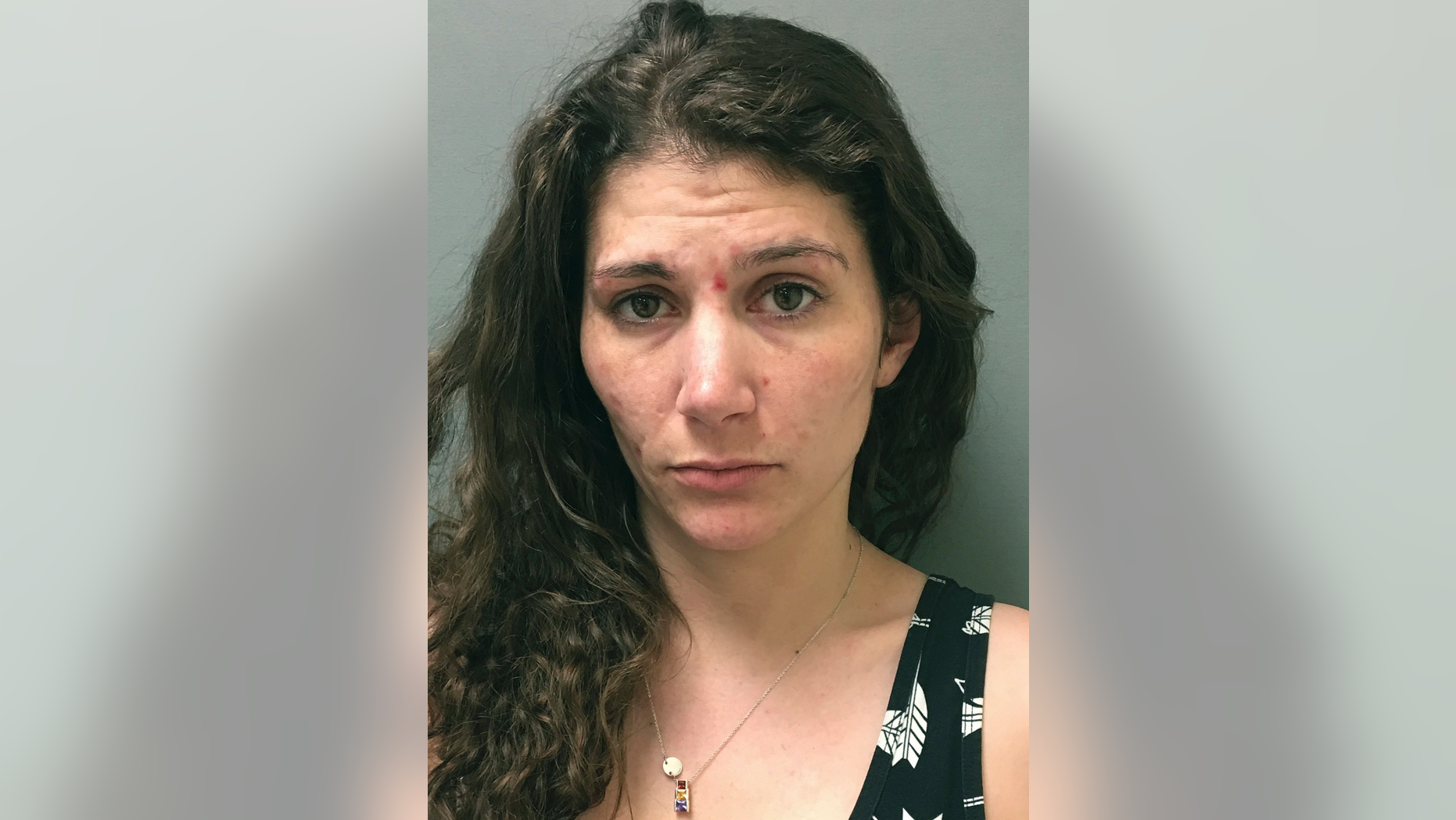 Erika Guttilla, 31, is accused of killing her live-in boyfriend and stashing his body in a trash bin for months.