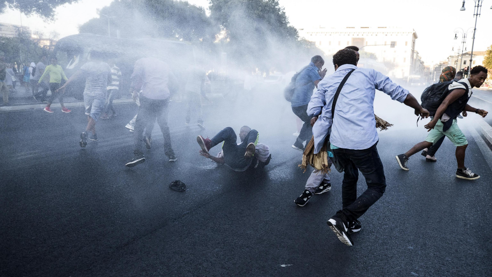 August 24, 2017: At least 13 were injured when police in Rome used water cannons to clear migrants out of a piazza.
