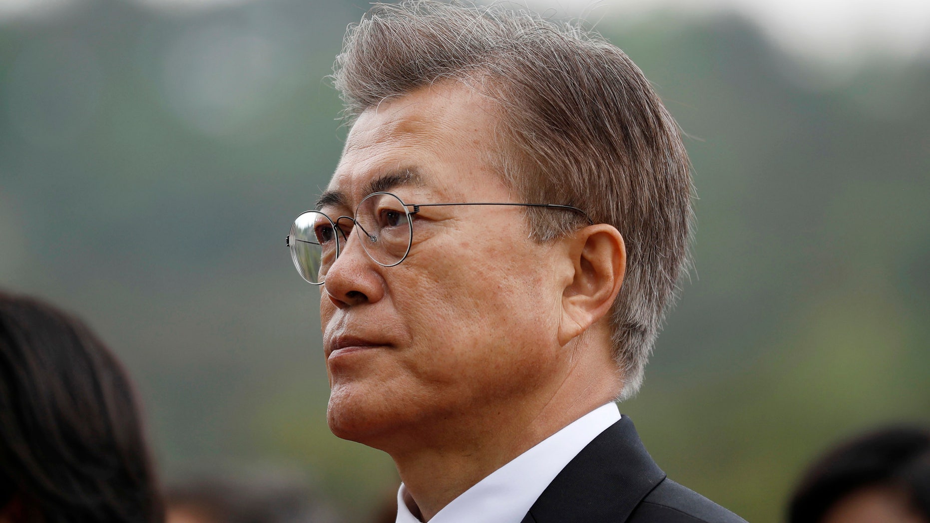 New South Korea's President Moon Jae-in arrives at the National Cemetery in Seoul, South Korea Wednesday, May 10, 2017. Moon visited the national cemetery where he honored the country's former presidents, independence fighters and war heroes as he began his presidential duties. (Kim Hong-ji/Pool Photo via AP)