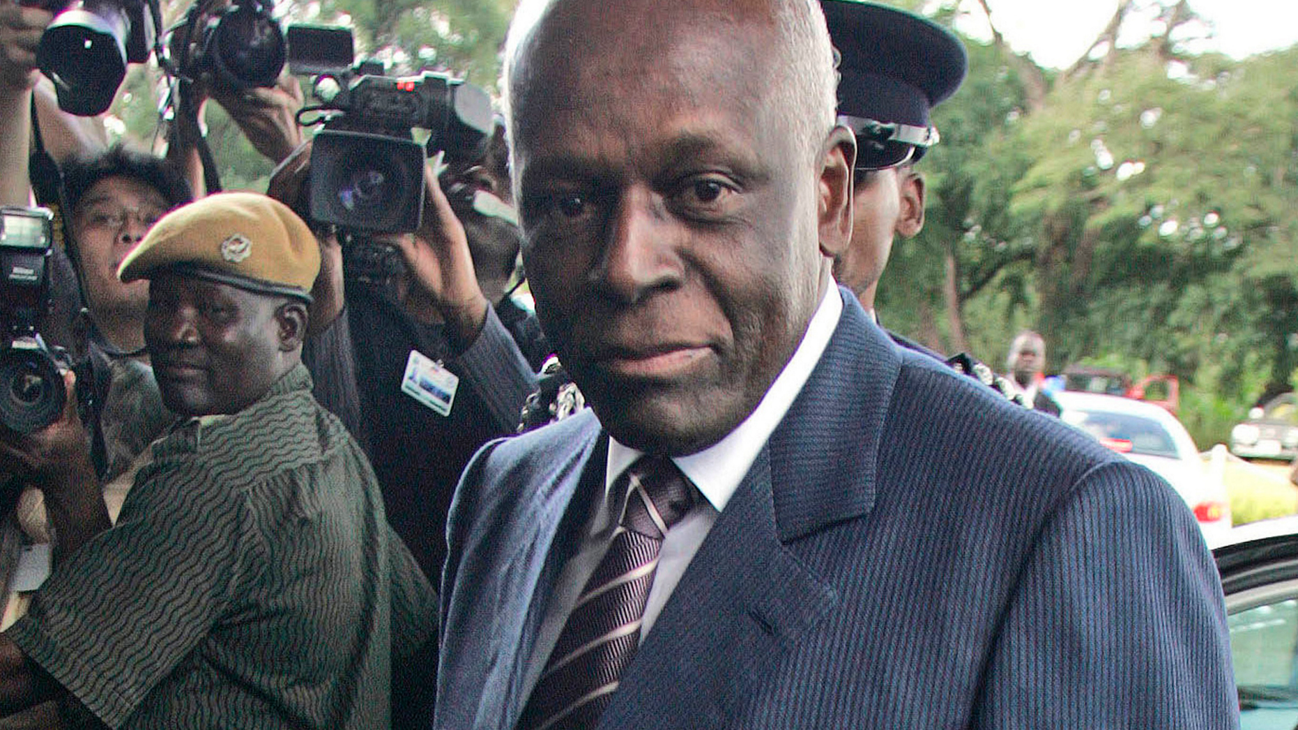 FILE - In this April 12, 2008 file photo, the then Angola President Jose Eduardo dos Santos arrives at the Mulungushi International Conference Center in Lusaka, Zambia. Dos Santos says he made mistakes during his long rule but holds his "head high" as he steps down as leader of the ruling MPLA party. (AP Photo/Themba Hadebe, File)