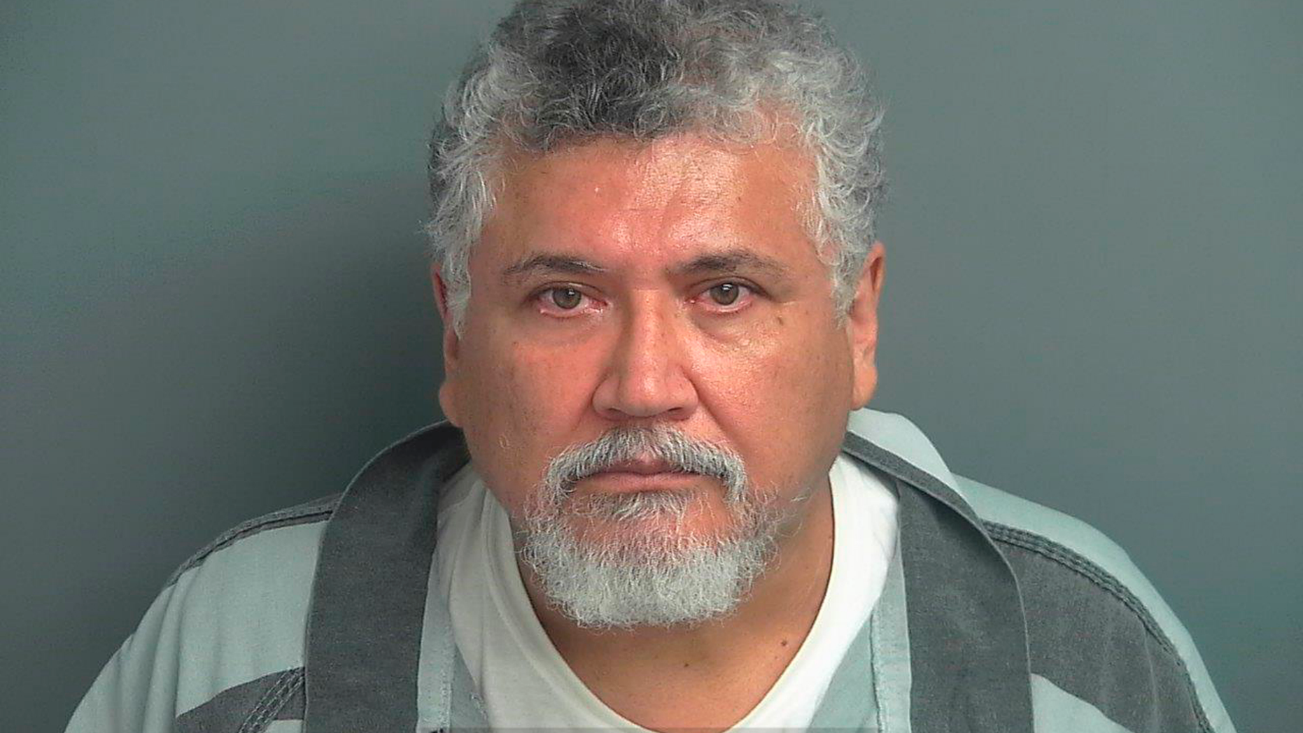 This undated photo provided by the Montgomery County Sheriff's Office shows Father Manuel LaRosa-Lopez. LaRosa-Lopez, was arrested Tuesday, Sept. 11, 2018, by police in Conroe, Texas and is accused of fondling two people when they were teenagers and he was a priest at Sacred Heart Catholic Church in Conroe. He is charged with four counts of indecency with a child. (Montgomery County Sheriff's Office via AP)