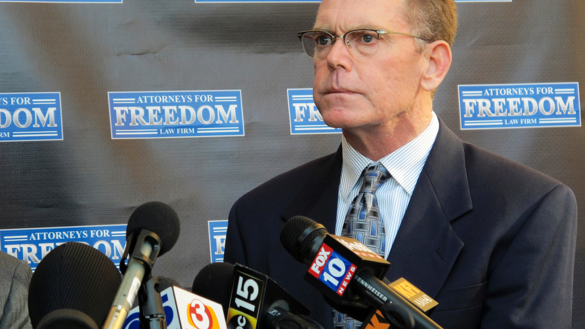 FILE - In this Feb. 2, 2018, file photo, Douglas Haig takes questions from reporters at a news conference in Chandler, Ariz. Haig, who has acknowledged selling ammunition to the gunman in the deadliest mass shooting in the nation's modern history, is due for arraignment Monday, Sept. 10, 2018, in federal court in Las Vegas. (AP Photo/Brian Skoloff, File)