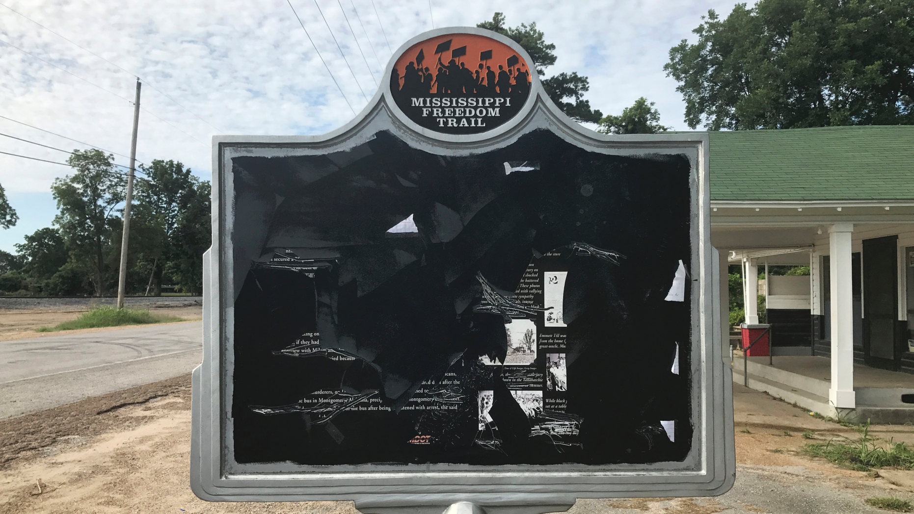 In this June 2017 photo, released by Allan Hammons, a civil rights historical marker in Money, Miss. is seen.