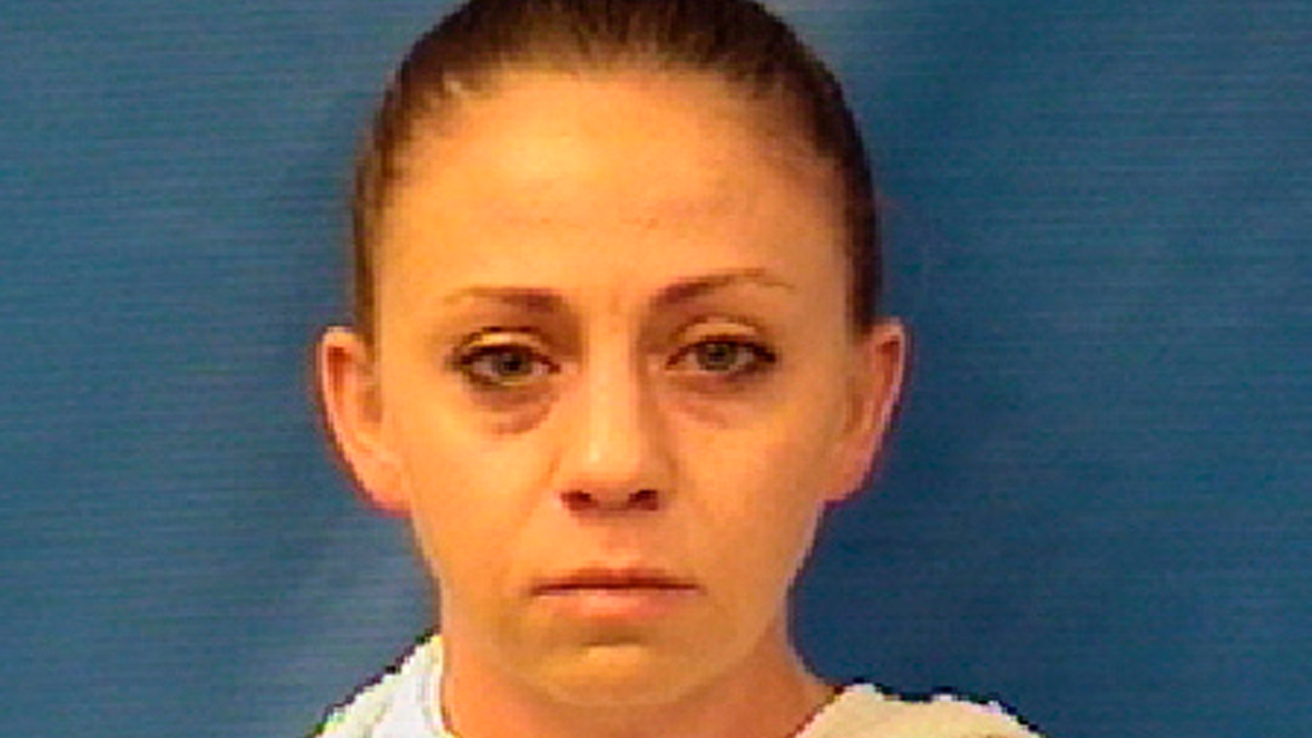 This photo provided by the Kaufman County Sheriff's Office shows Amber Renee Guyger. Guyger, a Dallas police officer, was arrested Sunday, Sept. 9, 2018, on a manslaughter warrant in the shooting of a black man at his home, Texas authorities said. The Texas Department of Public Safety said in a news release that Guyger was booked into the Kaufman County Jail and that the investigation is ongoing. It said no additional information is available at this time. (Kaufman County Sheriff's Office via AP)