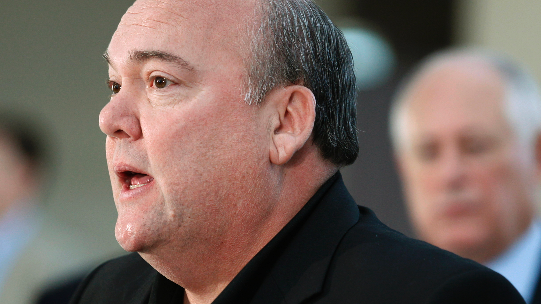 In this Oct. 21, 2011, file photo, John T. Coli Sr., president of Teamsters Joint Council 25, speaks at a news conference in Chicago.