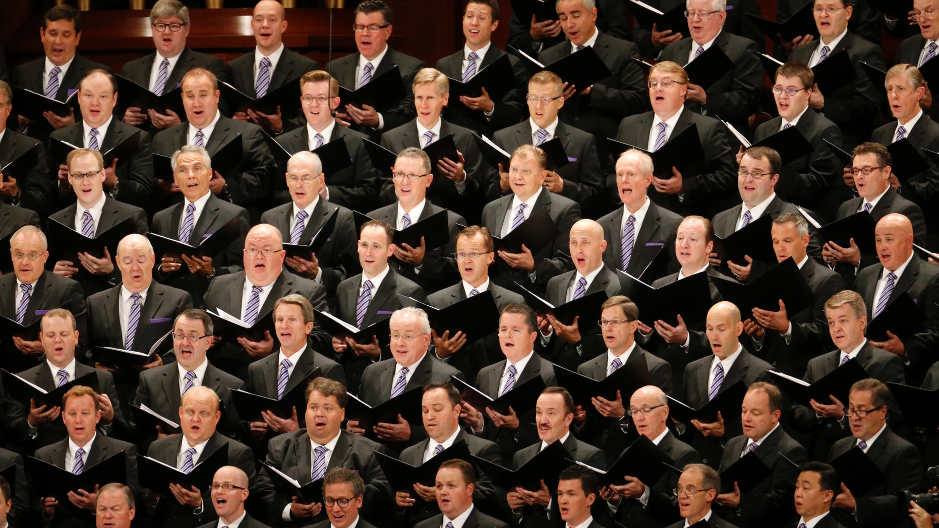The Mormon Tabernacle Choir performs during the morning session of the two-day Mormon church conference