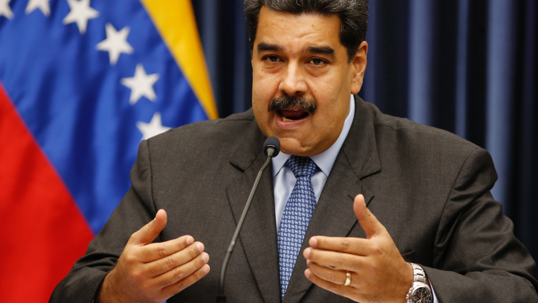 Venezuela's President Nicolas Maduro speaks during a press conference at the Miraflores Presidential Palace, in Caracas, Venezuela, Tuesday, Sept. 18, 2018. Venezuela and China have agreed to joint investments Maduro announced on Tuesday. (AP Photo/Ariana Cubillos)