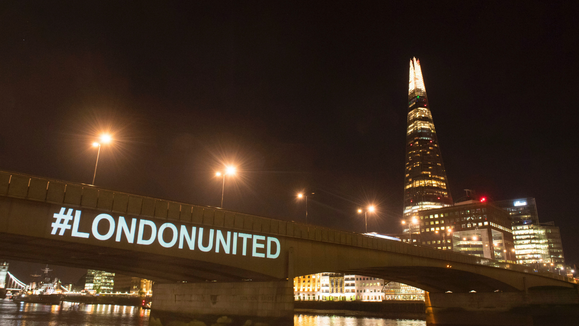 A tribute is projected onto the side of London Bridge, London, Sunday June 3, 2018, to mark one year since a deadly vehicle-and-knife attack on London Bridge.
