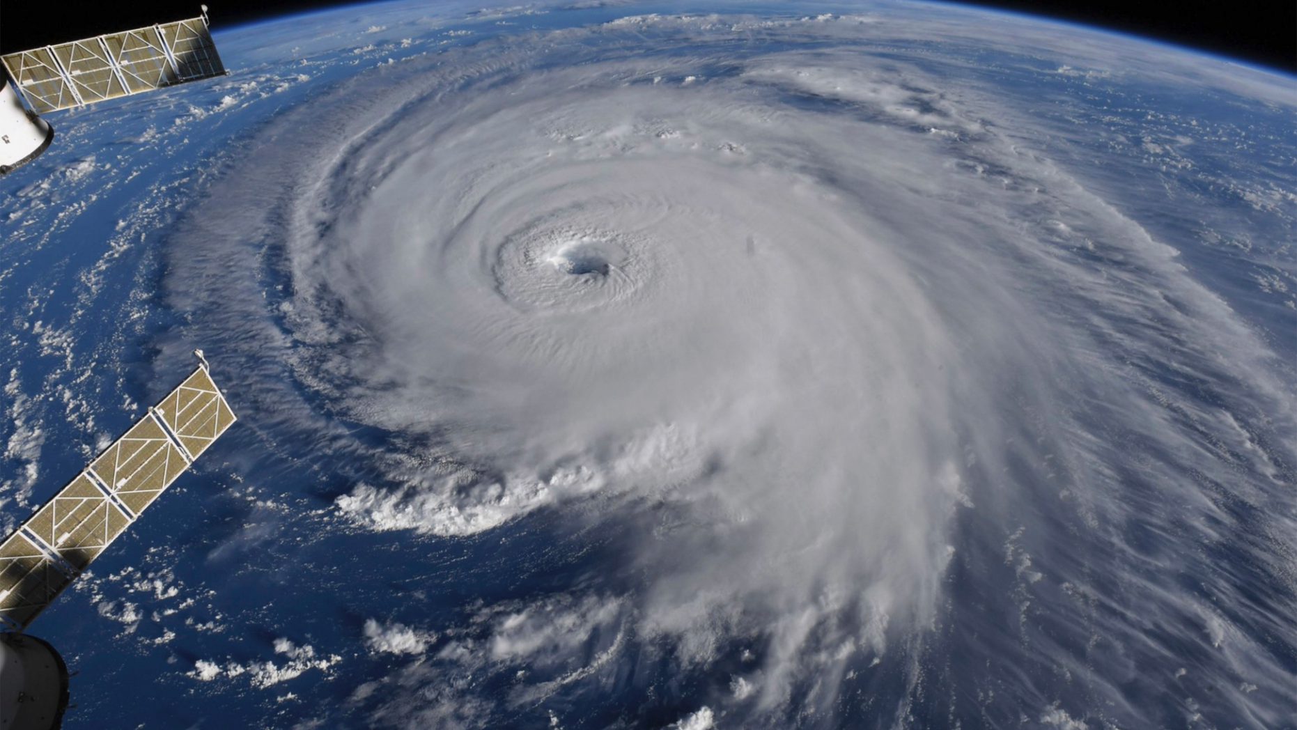 This image provided by NASA shows Hurricane Florence from the International Space Station on Wednesday, Sept. 12, 2018, as it threatens the U.S. East Coast. Hurricane Florence is coming closer and getting stronger on a path to squat over North and South Carolina for days, surging over the coast, dumping feet of water deep inland and causing floods from the sea to the Appalachian Mountains and back again. (NASA via AP)
