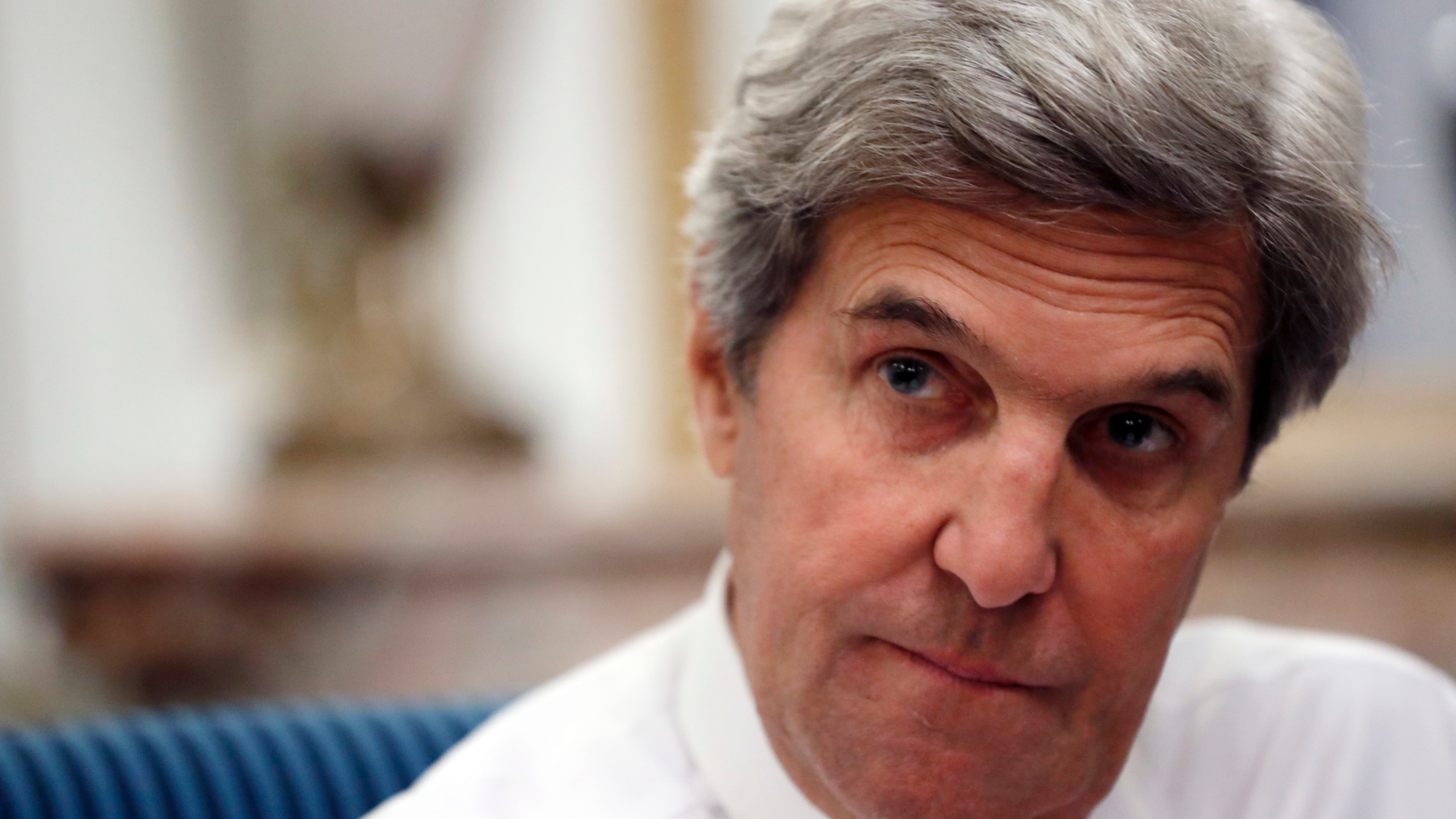 FILE - In this Jan. 15, 2017 file photo, U.S Secretary of State John Kerry speaks with the media after attending the Mideast peace conference in Paris. Secretary of State Mike Pompeo unloaded Friday, Sept. 14, 2018 on his Obama-era predecessor John Kerry for "actively undermining" U.S. policy on Iran by meeting several times recently with the Iranian foreign minister, who was his main interlocutor in the Iran nuclear deal negotiations. (AP Photo/Alex Brandon, Pool, File)