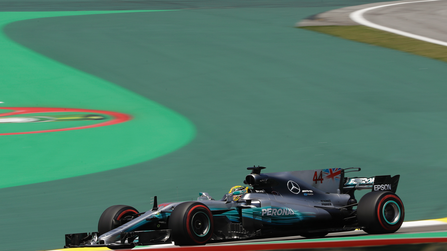 Mercedes Formula One racer Lewis Hamilton says members of his team were robbed at gun point in Brazil.