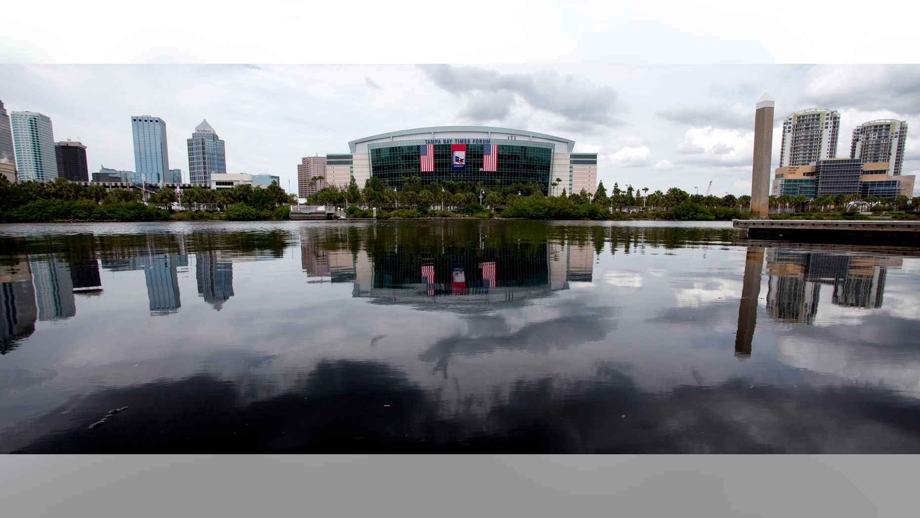 In this photo taken Aug. 22, 2012, the Tampa Bay Times Forum, site of the 2012 Republican National Convention, is viewed across the water of the Garrison Channel from Harbour Island in downtown Tampa, Fla. Weather forecasts continue to show Florida in the path of Tropical Storm Isaac. (AP Photo/The Tampa Bay Times, Carolina Hidalgo) TAMPA OUT; CITRUS COUNTY OUT; PORT CHARLOTTE OUT; BROOKSVILLE HERNANDO OUT; USA TODAY OUT; MAGS OUT