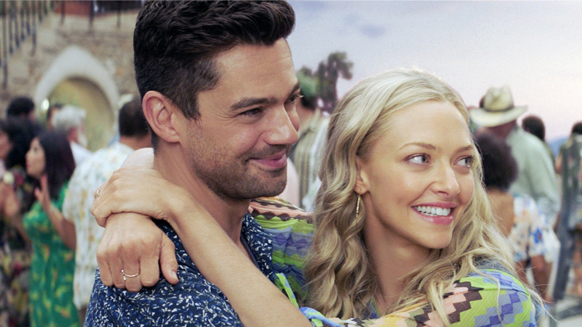 Dominic Cooper, left, opens up about working with ex Amanda Seyfried, right, on "Mamma Mia! Here We Go Again."