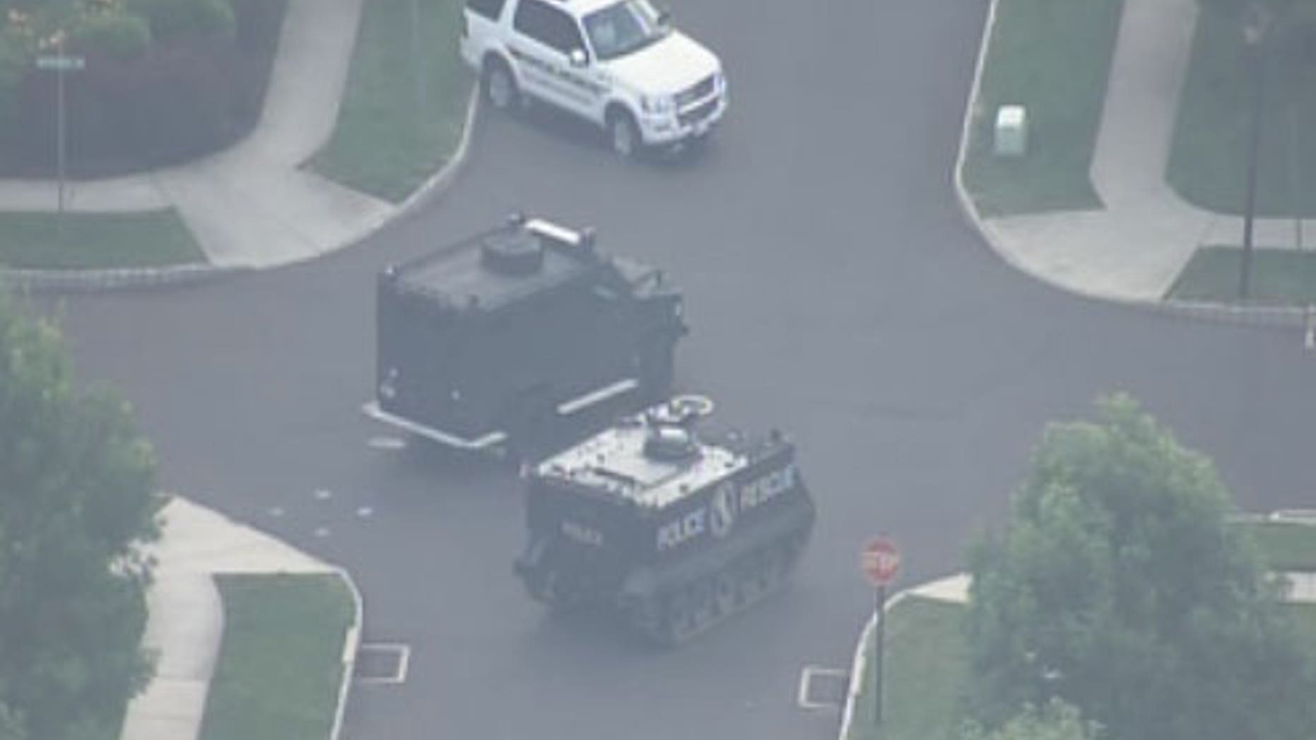 June 17, 2012: The scene outside of a Pennsylvania home as cops engage in standoff with armed suspect.