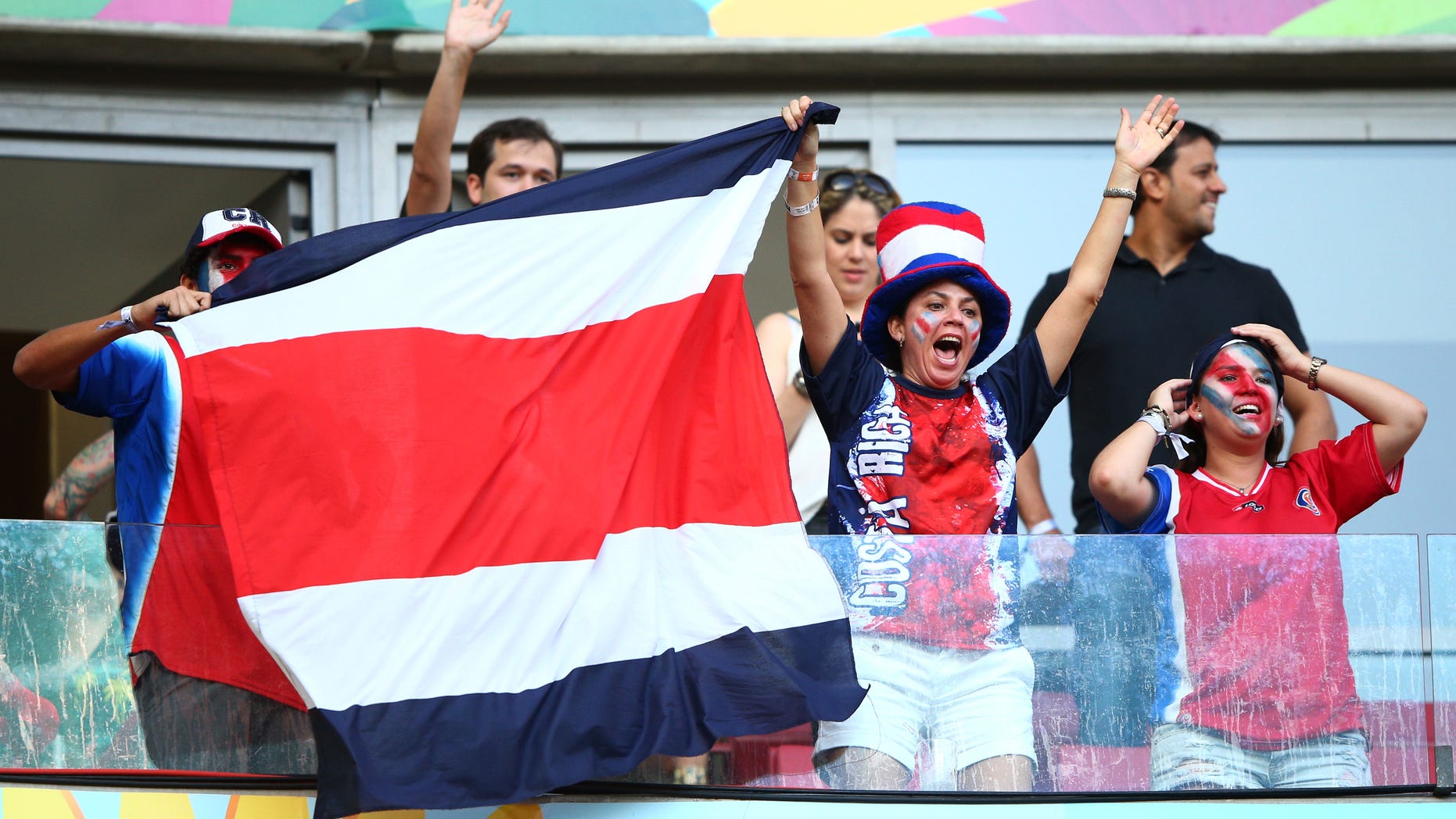 RECIFE, BRAZIL - JUNE 29: Costa Rica fans enjoy the atmosphere prior to the 2014 FIFA World Cup Brazil Round of 16 match between Costa Rica and Greece at Arena Pernambuco on June 29, 2014 in Recife, Brazil. (Photo by Ian Walton/Getty Images)