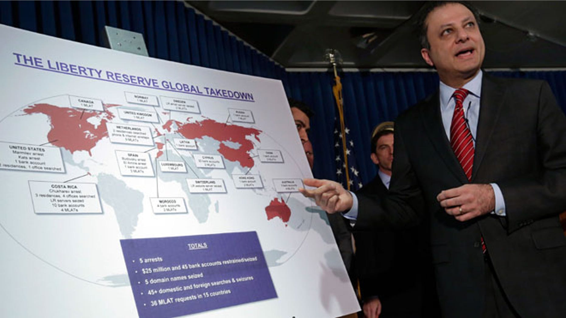 May 28, 2013: Preet Bharara, U.S. Attorney for the Southern District of New York, describes a chart showing the global interests of Liberty Reserve, during a news conference in New York.