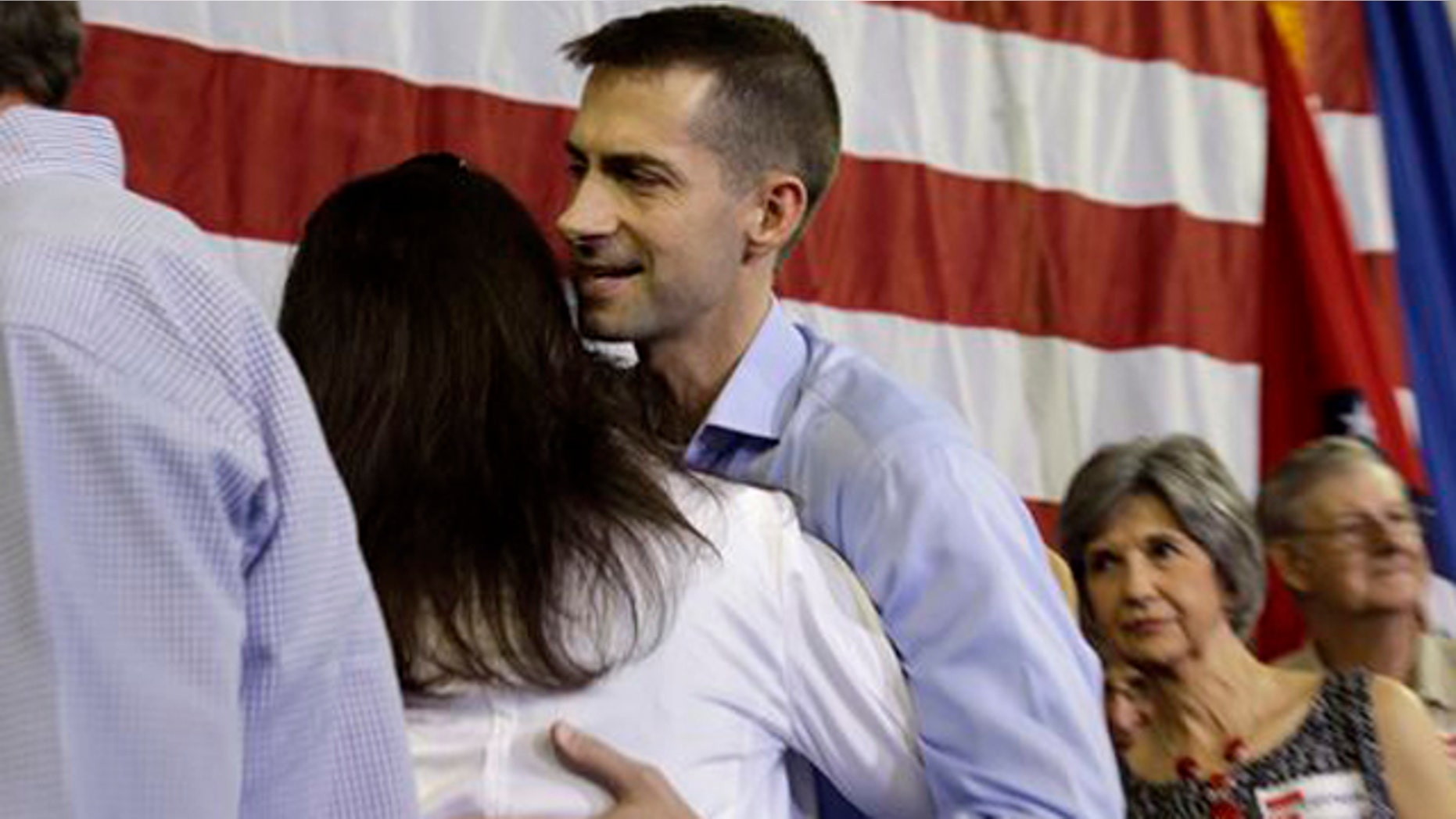 FILE: Aug. 6, 2013: Rep. Tom Cotton, R-Ark., center, greets a supporter after announcing his candidacy for Senate, in Dardanelle, Ark.
