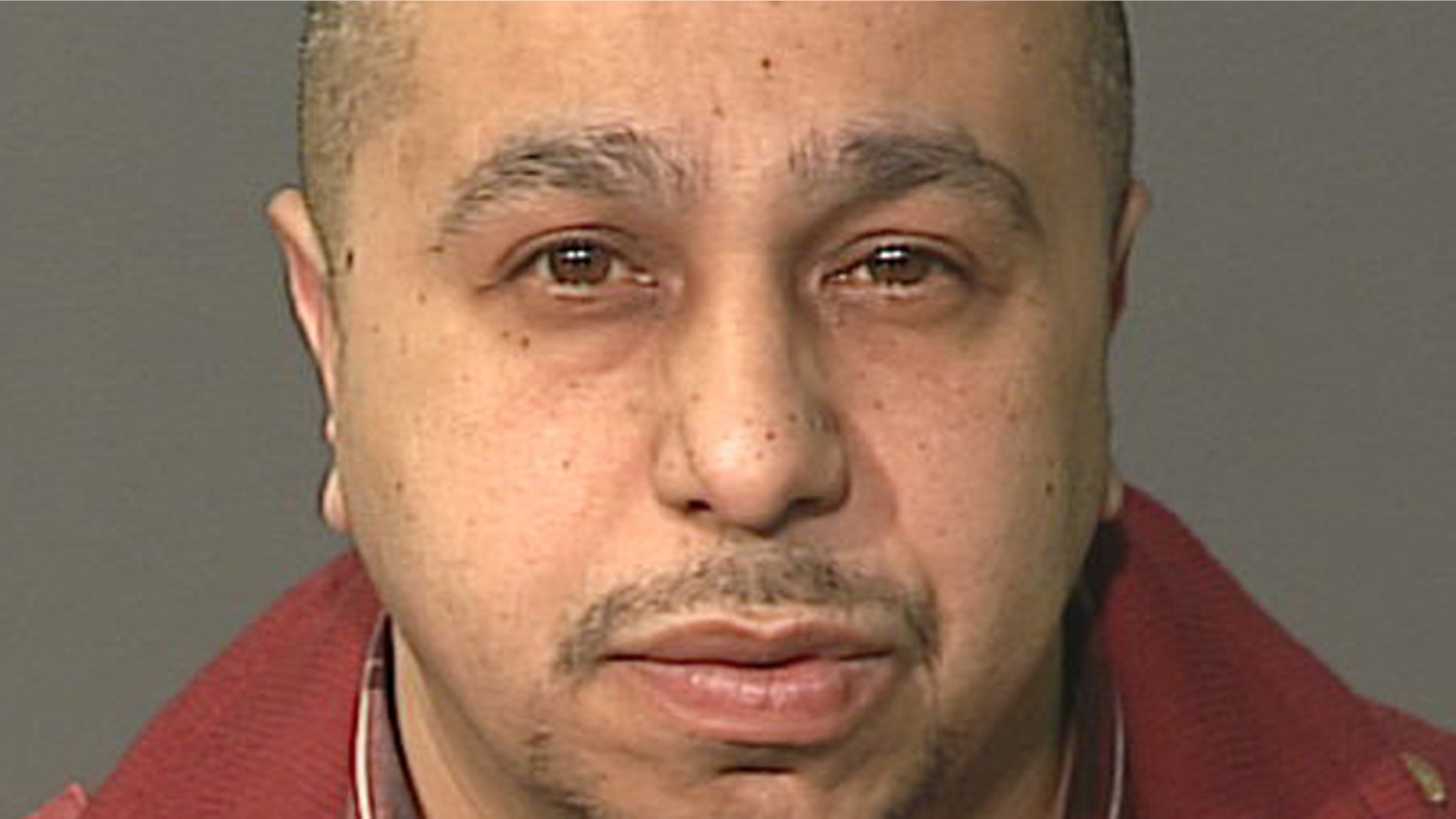 This undated photo, provided by the New York City Police Department, shows Julio Acevedo.