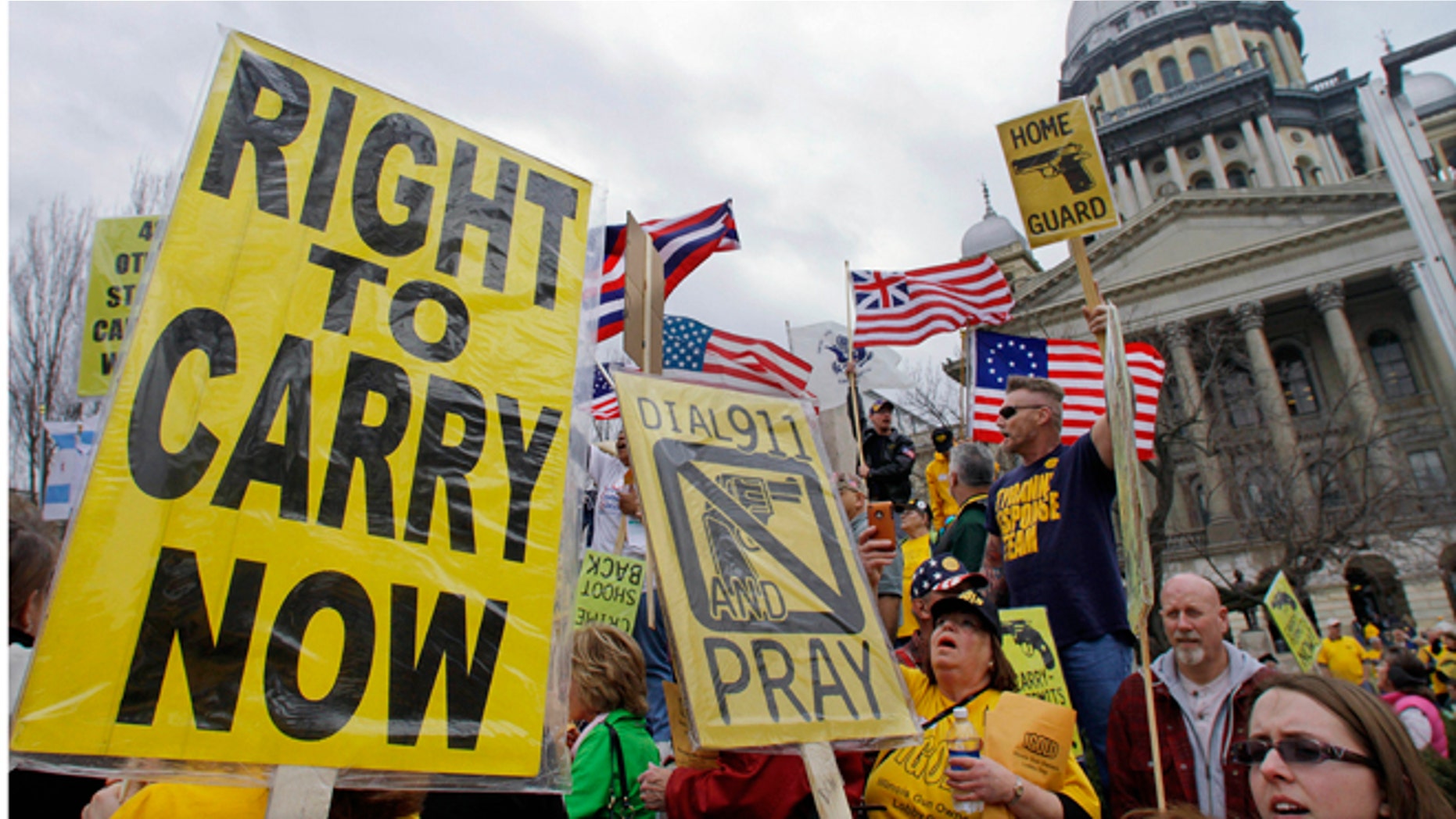 FILE: March 7, 2012: Gun owners and supporters participate in an Illinois Gun Owners Lobby Day rally at the Illinois State Capitol in Springfield.