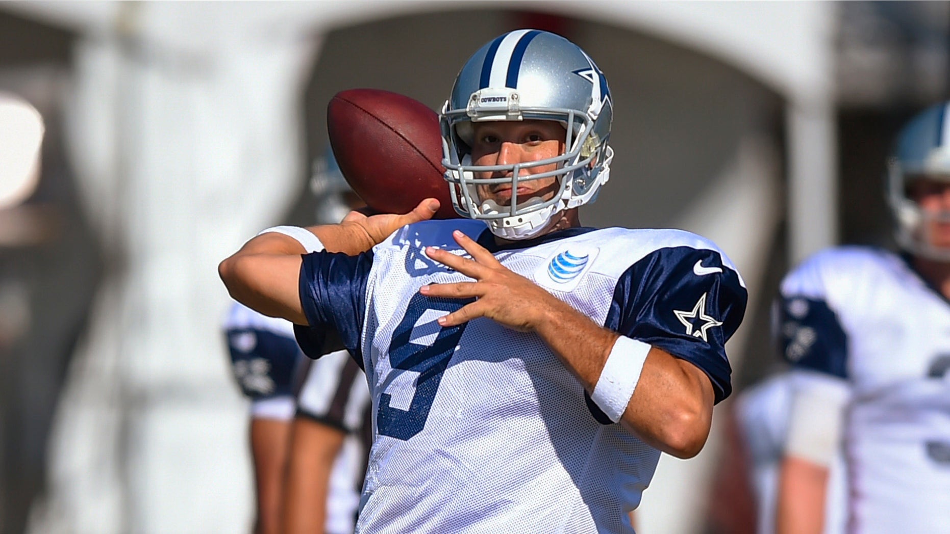 Dallas Cowboys quarterback Tony Romo throws during the NFL football team's training camp, Tuesday, Aug. 4, 2015, in Oxnard, Calif. (AP Photo/Gus Ruelas)