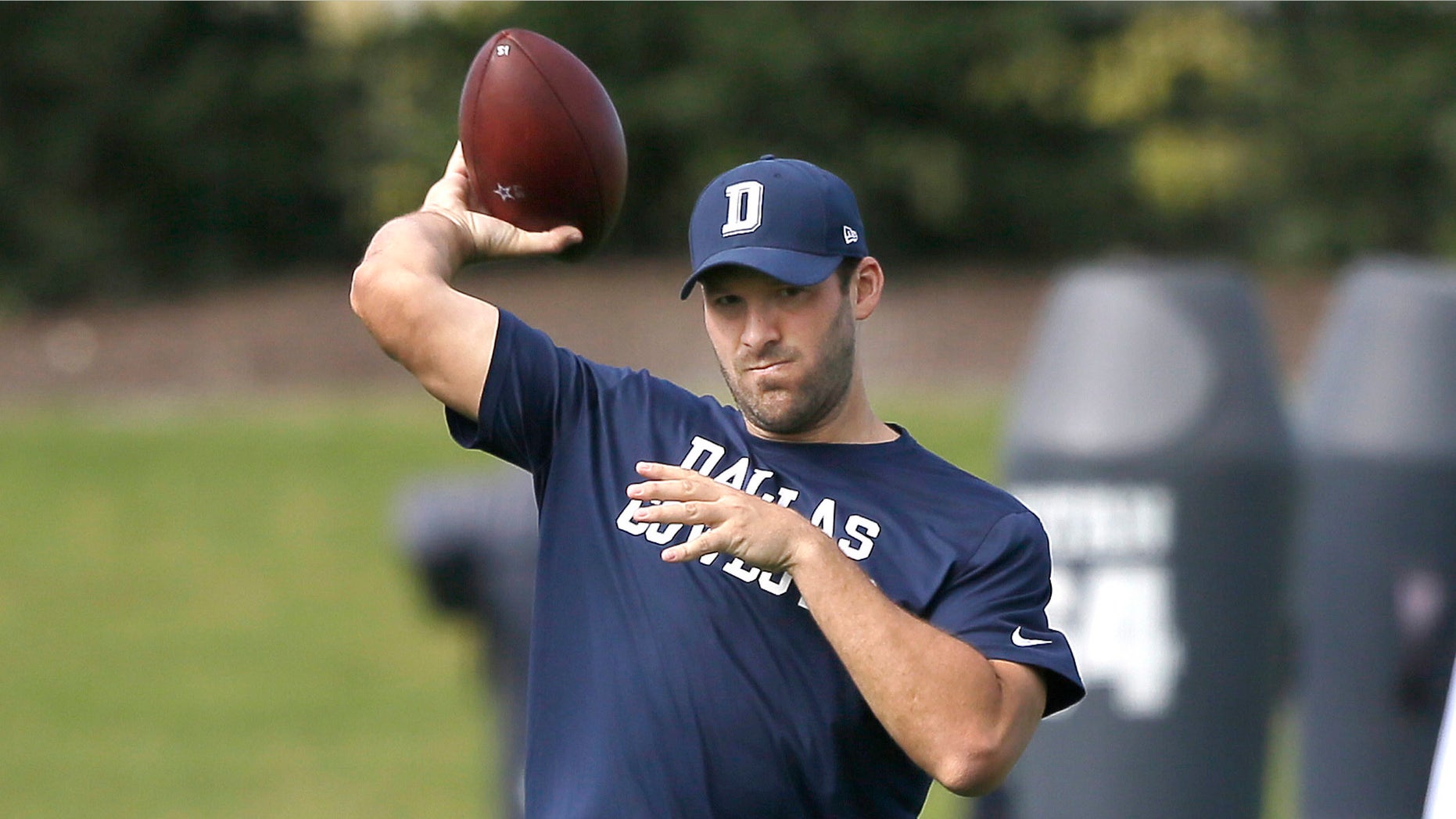 Dallas Cowboys quarterback Tony Romo throws during NFL football practice at the team's practice facility in Frisco, Texas, Wednesday, Oct. 26, 2016. (AP Photo/LM Otero)
