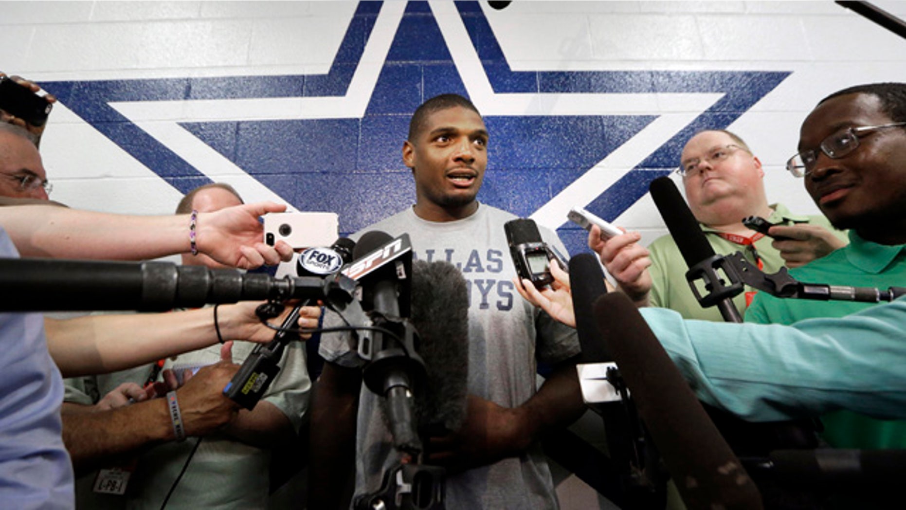 September 3, 2014: Dallas Cowboys practice squad player defensive end Michael Sam speaks to reporters after team practice at the team's headquarters in Irving, Texas. (AP Photo/LM Otero)