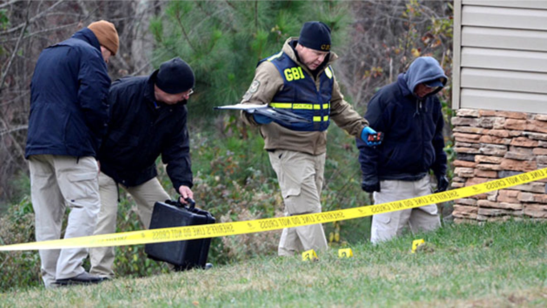 Investigators search for evidence after a police say a Georgia fatally shot an elderly man suffering from Alzheimer's. Police have not brought charges in the man's death.