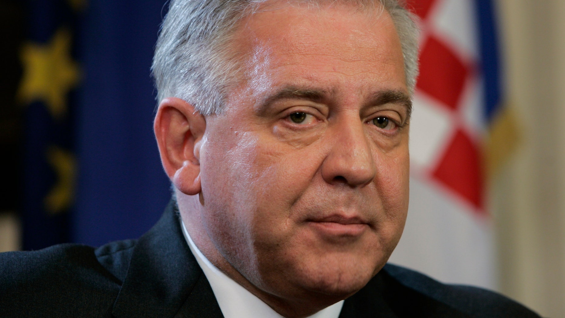 Former Croatian Prime Minister Ivo Sanader, shown here in this March 26, 2008 file photo, was arrested Dec. 10 on an international warrant a day after he left his home country amid a corruption probe.