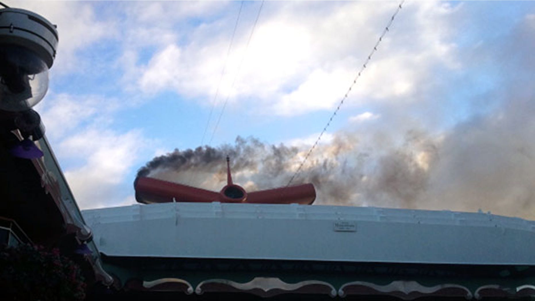 Nov. 8: Smoke billows from the engine compartment of the crippled cruise ship Carnival Splendor off the coast of Mexico. An engine fire aboard the 952-foot cruise liner that morning knocked out power early in its seven-day trip to the Mexican Riviera, setting the ship adrift about 200 miles outside San Diego and 44 miles off the coast of Mexico.