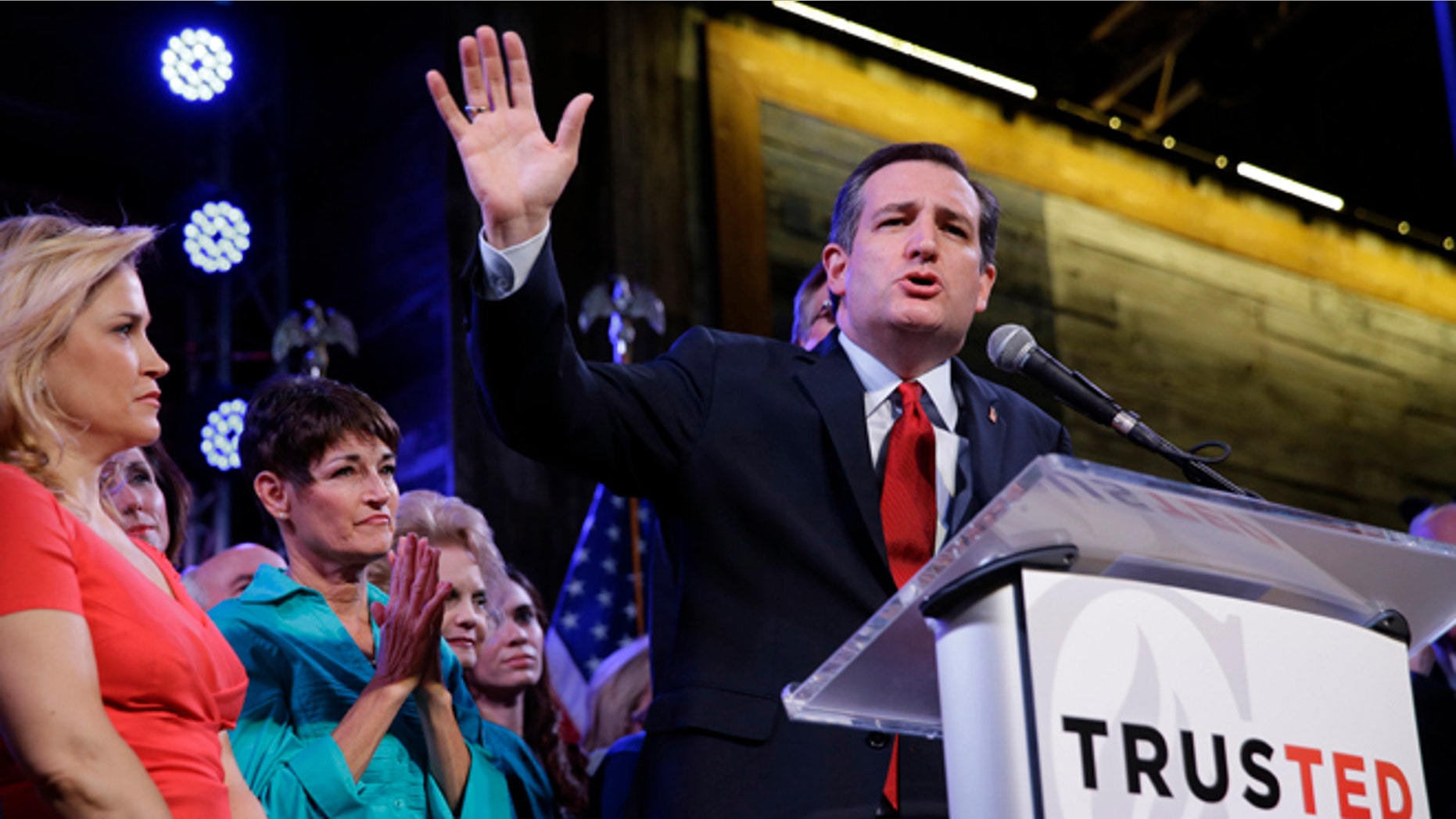 Republican presidential candidate, Sen. Ted Cruz, R-Texas, waves as he speaks during an election night watch party Tuesday, March 1, 2016, in Stafford, Texas. (AP Photo/David J. Phillip)
