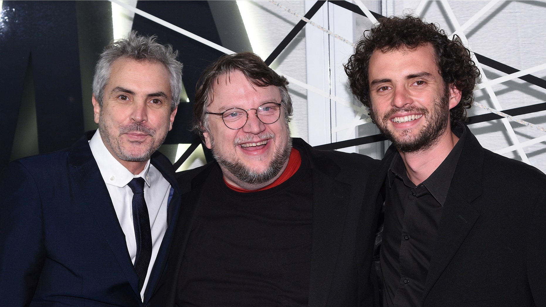 NEW YORK, NY - NOVEMBER 10: (L-R) Alfonso Cuaron, Guillermo del Toro, and Jonas Cuaron attend The Museum of Modern Art's 2014 Film Benefit Honoring Alfonso Cuaron at The Museum of Modern Art on November 10, 2014 in New York City. (Photo by Andrew H. Walker/Getty Images)