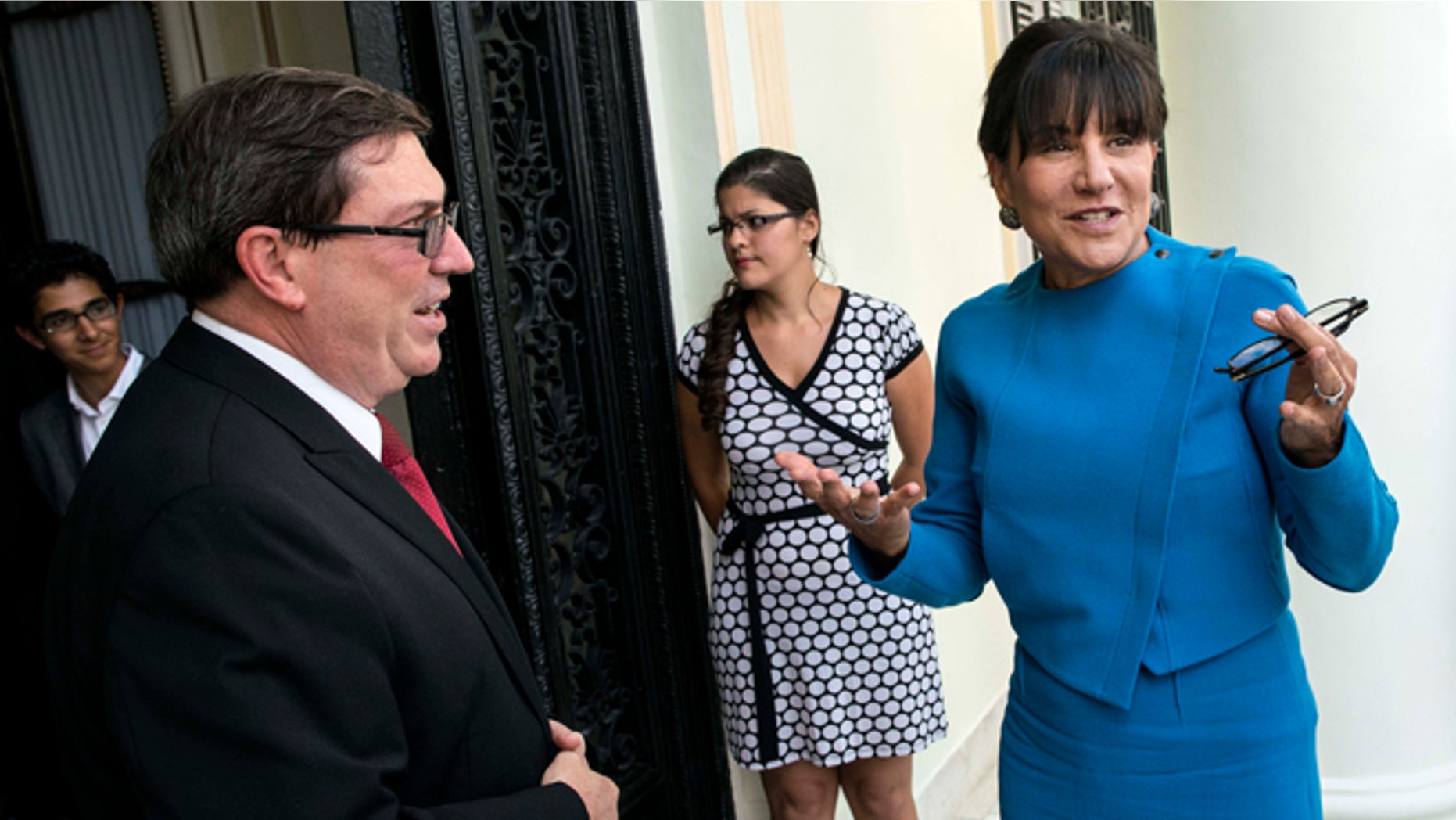 U.S. Commerce Secretary Penny Pritzker, right, talks with Cuba's Foreign Minister Bruno Rodriguez before a meeting in Havana, Cuba, Wednesday, Oct. 7, 2015. Pritzker is leading a delegation of officials from the U.S. Treasury, Commerce and State departments for meetings with officials from Cuban government ministries and businesses.(AP Photo/Ramon Espinosa)