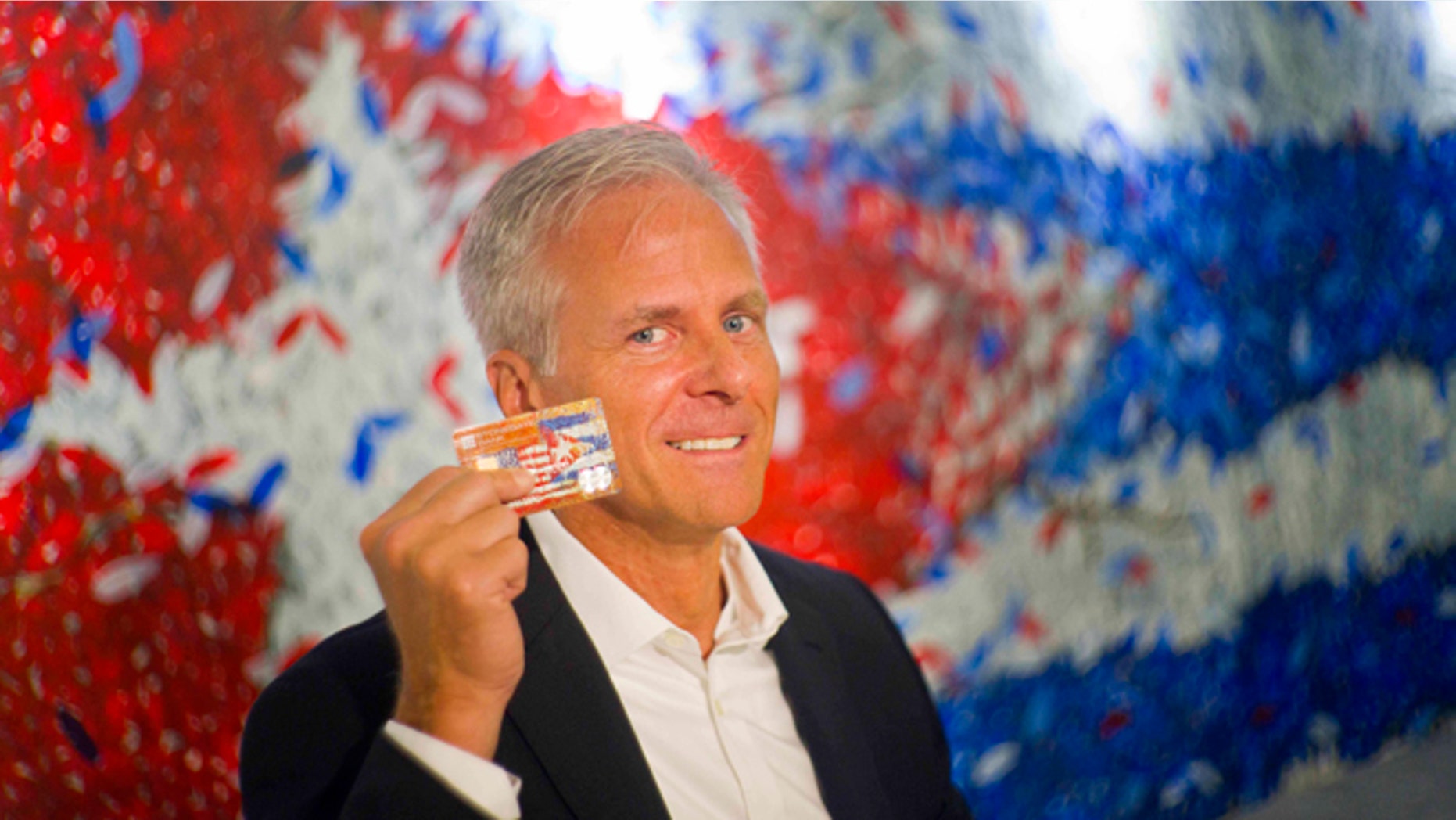 In this June 8, 2016 photo, Stonegate Bank President David Seleski poses with a credit card during an interview in Havana, Cuba. Stonegate, a small Florida bank, will issue the first U.S. credit card designed to work in Cuba on Wednesday, June 15, making it easier for American companies to do business on an island largely cut off from the U.S. financial system. (AP Photo/Ramon Espinosa)