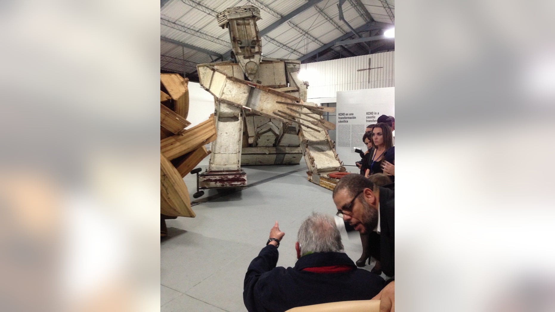 Jan. 8, 2014: In this photo released by Cubadebate, Cuba's former President Fidel Castro, bottom, back to camera, attends the inauguration of the cultural center, Studio Kcho Romerillo, Laboratory for Art, in Havana, Cuba.