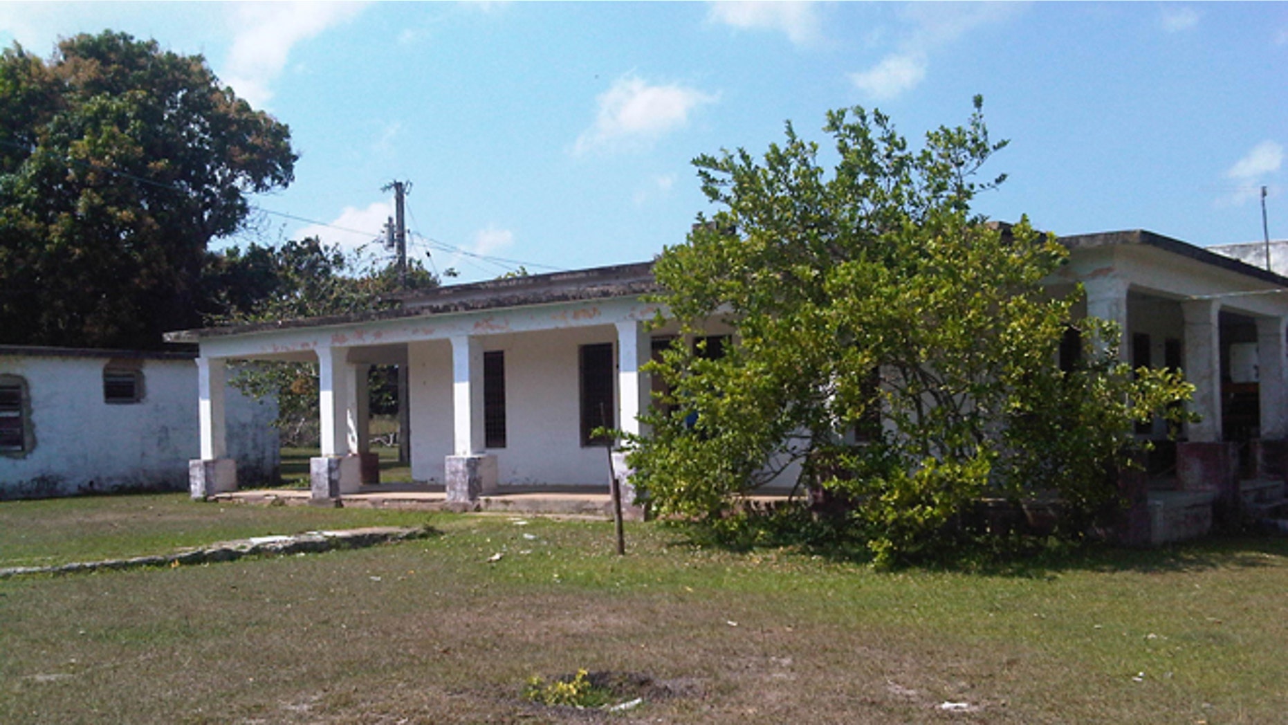 This Friday, March 20, 2105 photo shows the house that used to belong to U.S. citizen Daniel Smith in the Isle of Pines, Cuba. The property was confiscated by the new Cuban government after the revolution. (AP Photo/Milexy Duran)