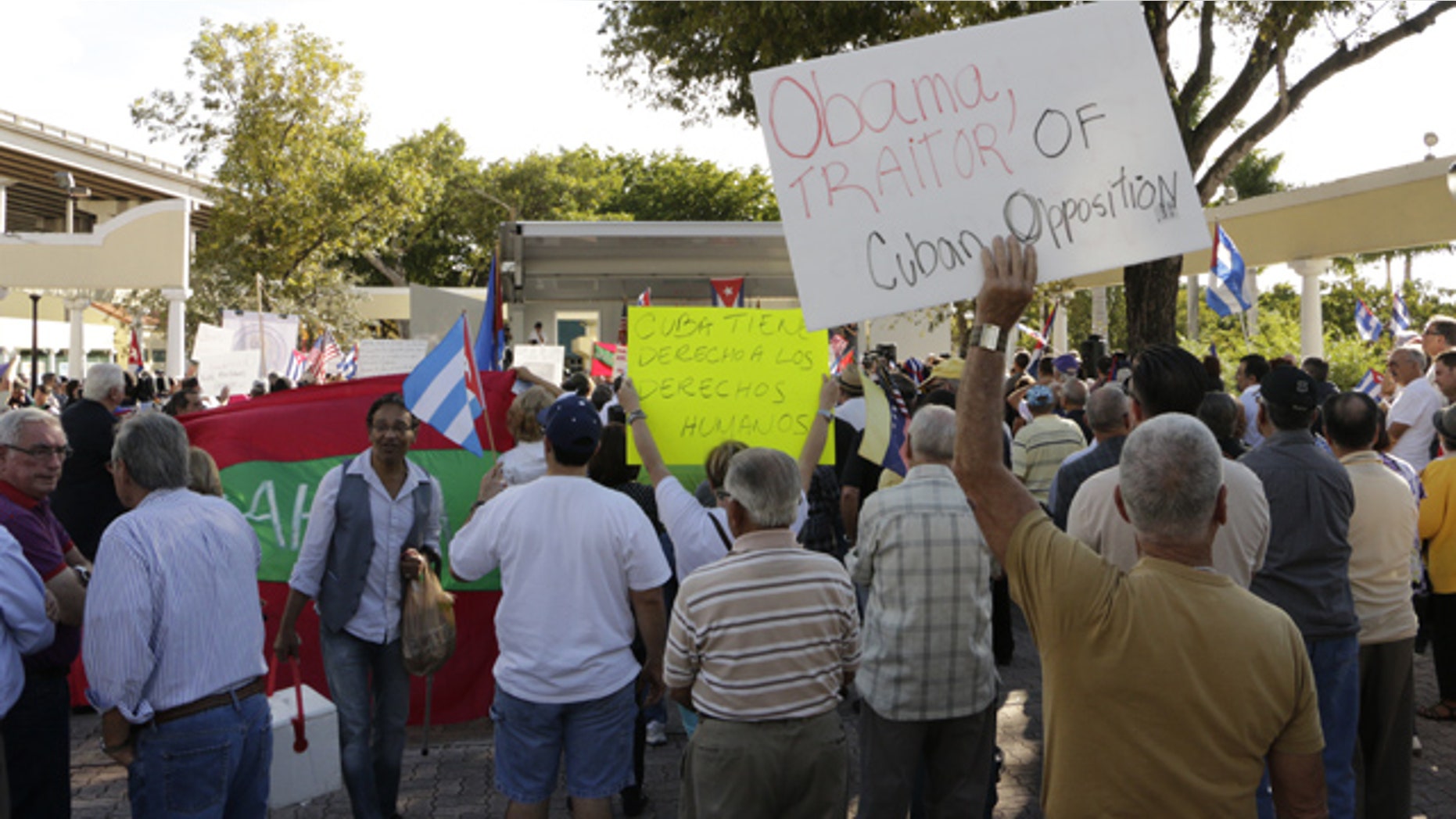 Dec. 20, 2014: More than 200 Cuban-Americans protest President Barack Obama's plan to normalize relations with Cuba in Miami. Many said they felt betrayed by the plan. (AP Photo/Rachel La Corte)