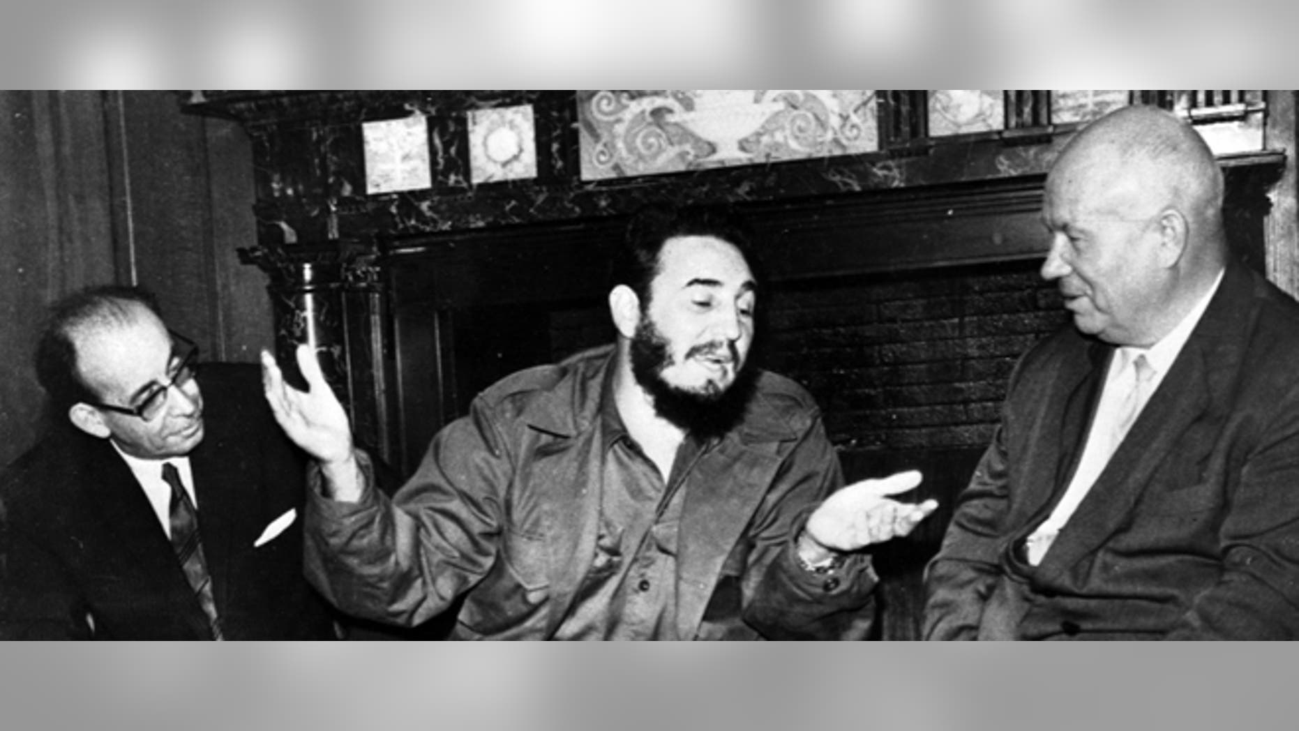 In this Sept. 20, 1960 photo, Cuba's leader Fidel Castro, center, speaks with Soviet Premier Nikita Khrushchev, right, as his Foreign Minister Raul Roa, left, looks on at the Hotel Theresa during the United Nations General Assembly in New York. The world stood at the brink of Armageddon for 13 days in October 1962 when President John F. Kennedy drew a symbolic line in the Atlantic and warned of dire consequences if Soviet Premier Nikita Khrushchev dared to cross it. On the eve of the 50th anniversary of the Cuban missile crisis, historians now say it was behind-the-scenes compromise rather than a high-stakes game of chicken that resolved the faceoff, that both Washington and Moscow wound up winners and that the crisis lasted far longer than 13 days. (AP Photo/Prensa Latina via AP Images)